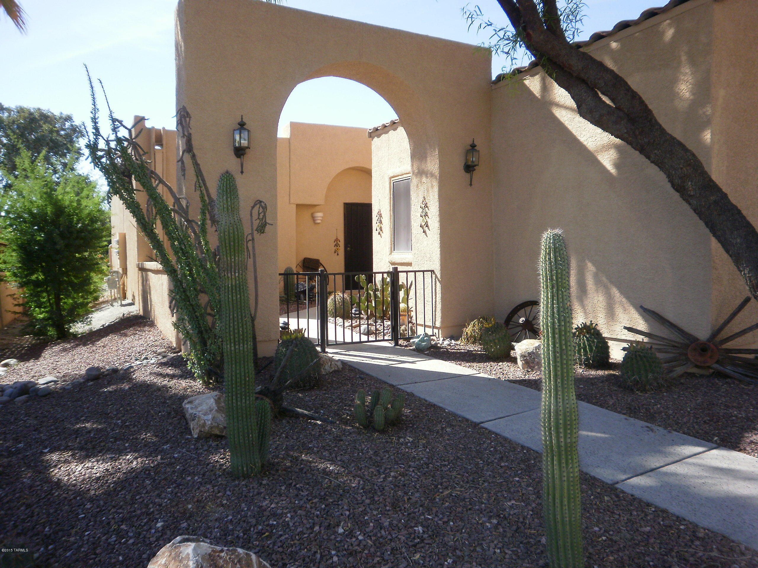 Beautifully remodeled. 42'' Cherry cabinets with roll-outs, granite countertops and stainless steel appliances - 25 cf frig/freezer/ice-maker included. New light fixtures throughout. New 6 panel doors and hardware. New skylights (6) with diffusers. Open floor plan with high ceilings. No pop corn. New granite in both baths.  Delightful front courtyard and rear patio with wonderful desert plantings.  Near all community amenities - 2 pools, spa, gym, BBQ.  Ample guest parking. Private corner spa conveys. All Furnishings for sale.