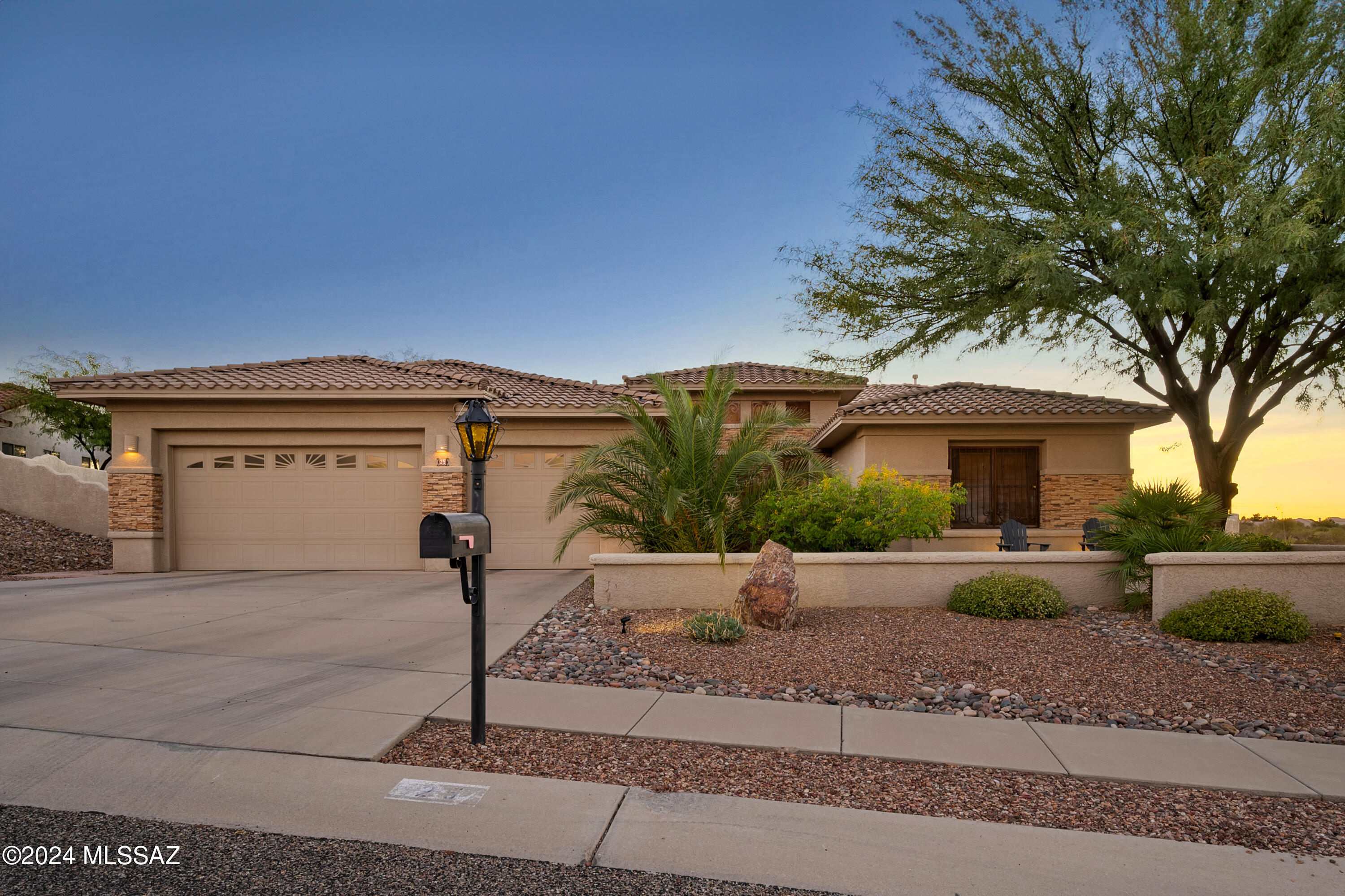 One of a kind setting in Monument Estates offers the best of desert living. Exceptional front entry accompanied w/ a flagstone patio facing the Catalina Mtns! Walk into an open flrplan centered around large living space w/ high ceilings & sliding glass doors for natural light. Expansive kitchen w/ island looks onto formal dining area +living room. Equipped w/ gas range + undermount lighting. Generous primary suite, w/ dual vanity, walk in shower (ADA), + extended closet. Walled in backyard expands across the covered back patio accommodating mtn views from the pool/spa. Turf w/ putting green + pavers make for easy care. Motorized rolling screens help block sunlight, keeping the inside cooler. PLUS an out door BBQ + counterspace w/ sink. Two additional guest bedrooms + dual sinks in guest bathroom complete this outstanding property. Large driveway leading to 3 car garage is a huge bonus. Take advantage of this great property and enjoy proximity to hiking, shopping and more:
Est. Distance to:
- Tucson International Airport, 17 miles
- UofA, 13 miles
- Raytheon, 22 miles
- I-10, 12 miles