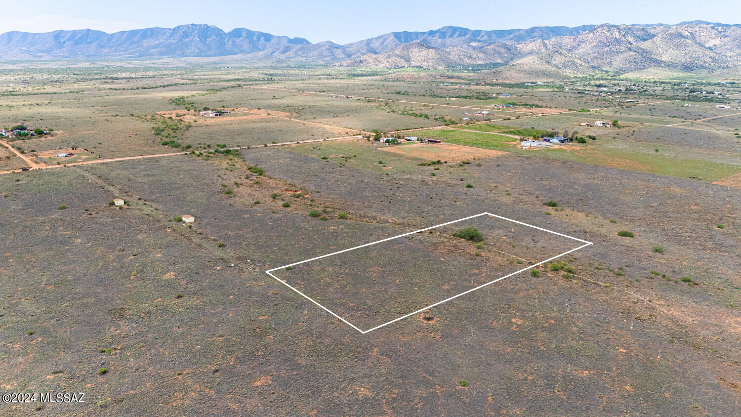 PRICE REDUCED! Discover the perfect blend of privacy and convenience on this ready-to-build 4-acre lot in Sunsites. With stunning views of Cochise Stronghold and the Dragoon Mountains, this lot offers a tranquil, country feel while being just minutes from town. Enjoy the rare beauty of dark skies and breathtaking views of the Milky Way right from your backyard. The property features underground power and a shared well with an installed water line and meter. Coveted RU-4 zoning allows for the Cochise County Opt-out, giving you exceptional flexibility for your build. With few neighbors and the option to purchase four adjoining lots on the well-share, the seller is open to combining parcels to expand your vision. This is an ideal location for your custom retreat.