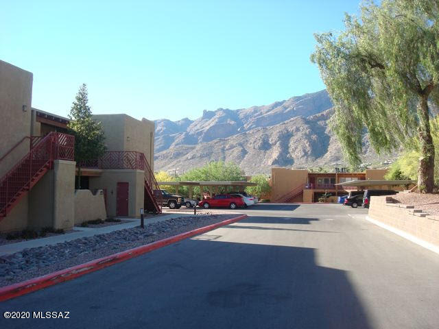 Location Location Location! Lovely Ground floor 2 bedroom, 1 bath condo in a quiet Catalina Foothills community. Great amenities include 50' heated pool, over-sized spa, fitness center and walking/jogging trails. Breathe clean air while walking through the desert solitude surrounding this luxury community. This unit has a wood-burning fireplace in the living room. Minutes from golf courses, shopping and schools. Majestic mountain views with serene surroundings.