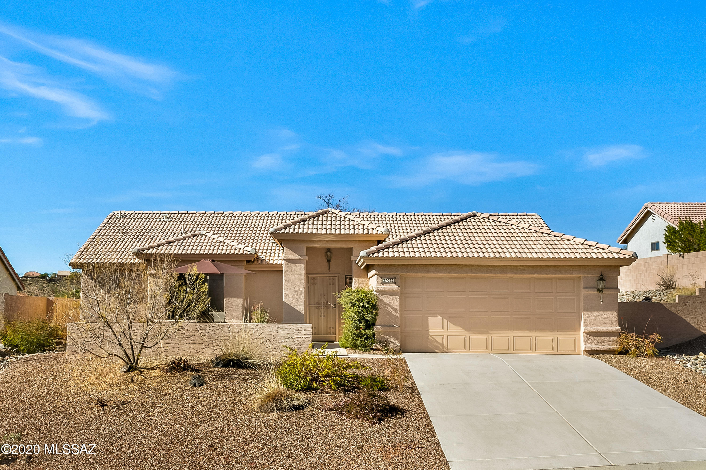 We are proud to present a Sonora home with mountain views from your front patio & located on a private lot.  Turn key with 2 Bedrooms, 2 Bathrooms, 1,439 SF, & 2 Car Garage this is just the place to call home.  Open floor plan & serene colors.  Light & bright. Spacious dining area. Kitchen with lots of cabinets & granite composite sink.  Owner's Suite with bathroom & walk-in closet.  Guest bedroom with mountain views. Laundry room with abundance of cabinets.  Screened in patio to enjoy indoor/outdoor life.  Extended patio with tile.  Privacy & large yard with no one behind you.  Welcome home! SaddleBrooke is Tucson's #1 Active Adult Community with golf, restaurants, fitness centers, pools, 100's of activities and more...