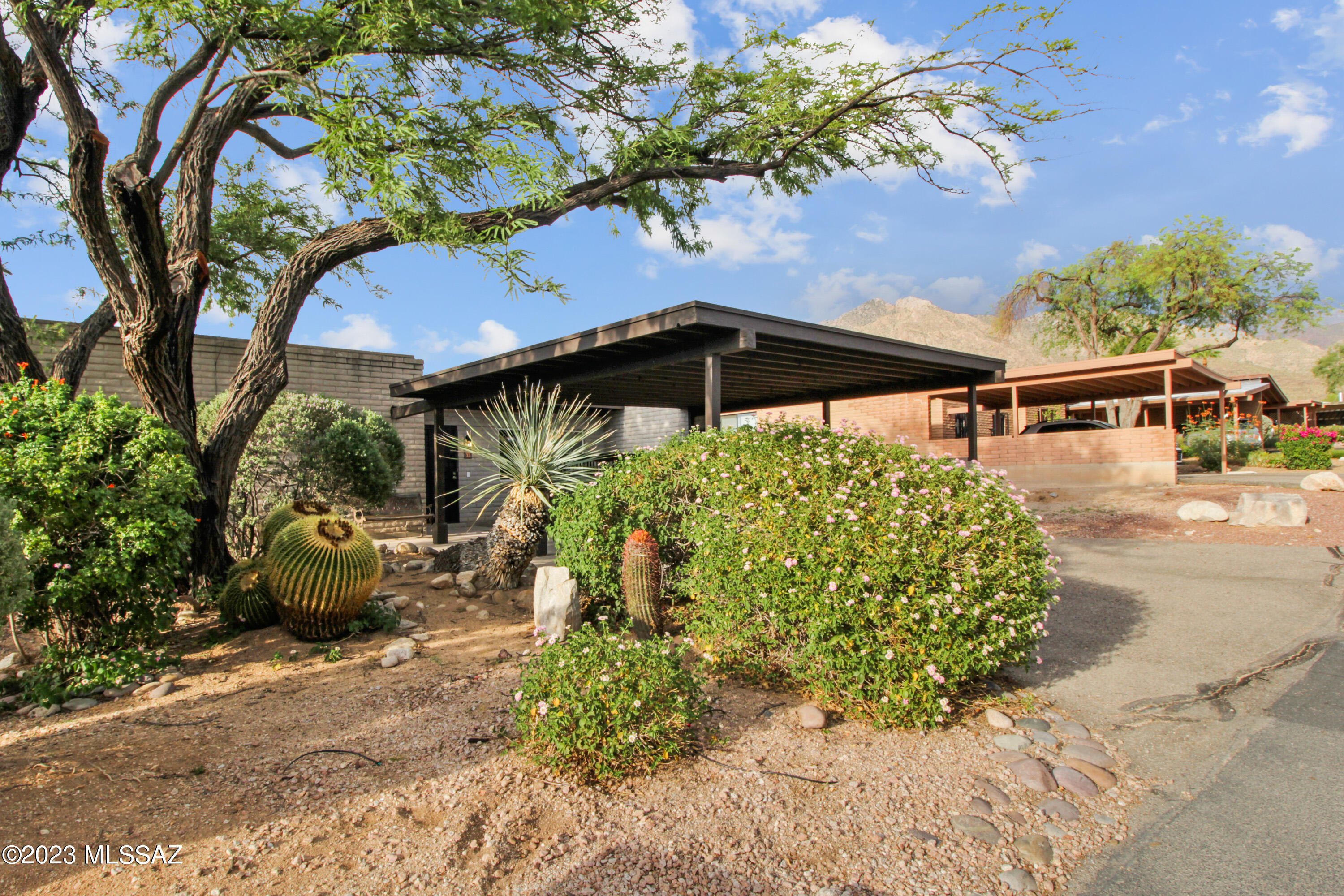 Range priced from $345k to $350k. Turnkey 3 bedroom, 2 bath end-unit townhome with one adjoining neighbor near a plethora of amenities, shopping, restaurants, etc. Relax in this stylish and comfortable home with warm fireplace, two-toned paint, concrete floors, new fans, modern kitchen and bathrooms, and a private entertaining backyard with mountain views. Water heater replaced Dec 2022. HVAC was replaced 2 years ago and is under warranty. Verde Catalina Community offers a sparkling pool and lounging area. Water and sewer included in HOA fee. Come. See. Stay!