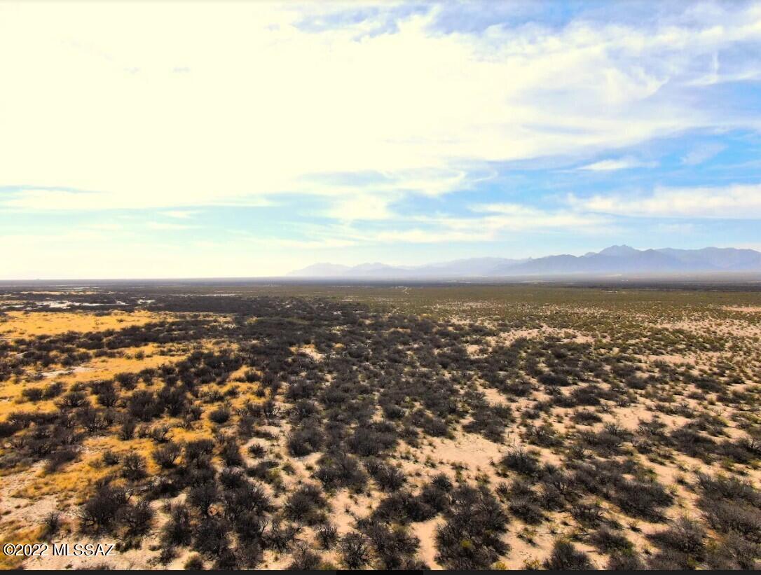 A big property for your big dreams! This 300-acre property consists of two adjoining parcels and is just south of San Simon is ready for all your ideas. It has easy access from Parker Road and is just 1.8 miles south of I-10. Power is along the road. The land is mostly flat with a gentle slope on the eastern edge, perfect for raising cattle, horses, goats, or sheep. This area has lots of irrigated farming, with the closest farms less than a mile away. Only a few other homes are in the area, so you will have lots of privacy to enjoy your land your way. Although the land is typically arid, summer monsoons bring green grass and cooler temperatures to the area. It is a rare find with power available and easy access to I-10.
