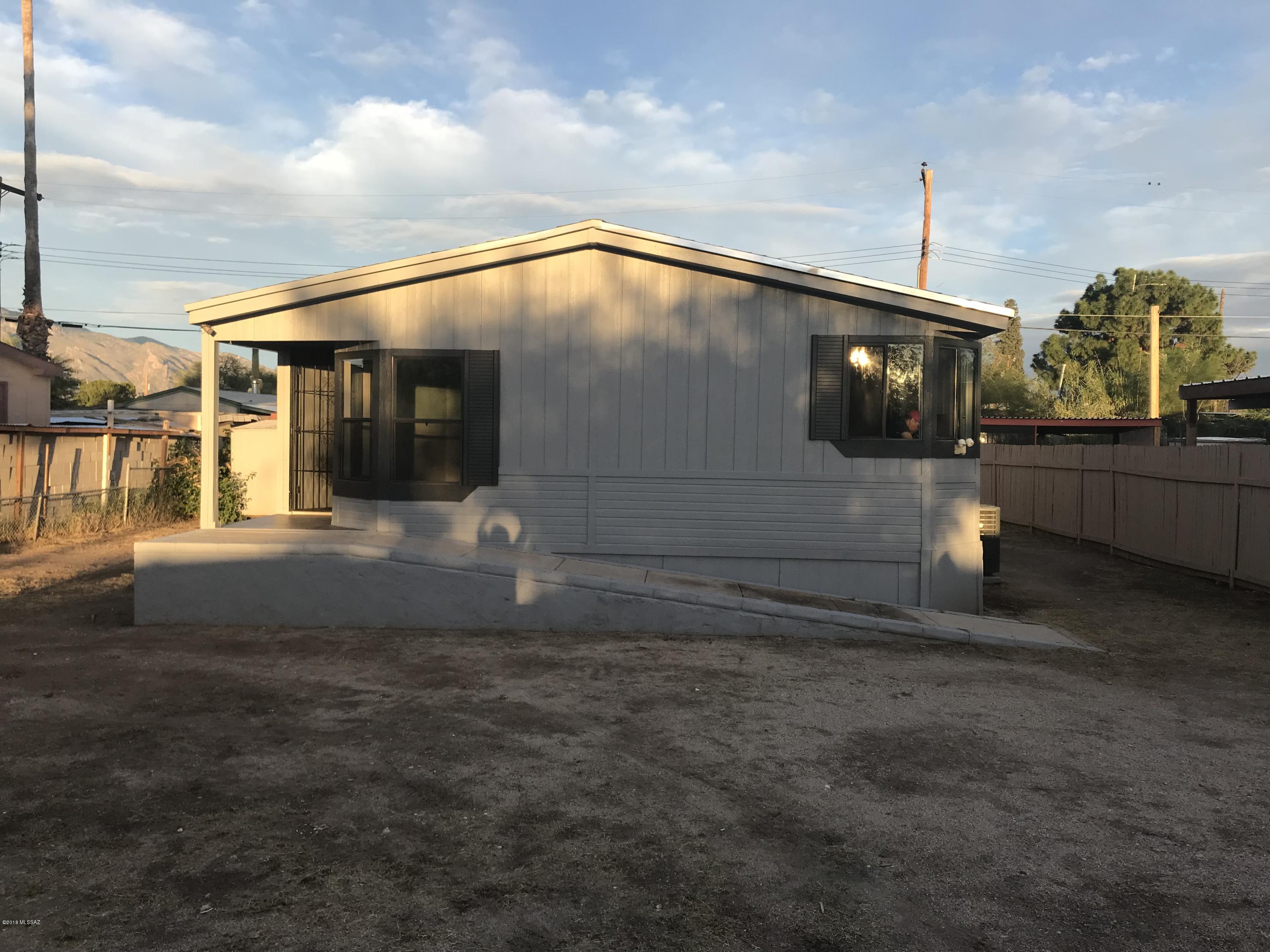 This mobile home shows like a house.
Beautiful new flooring and freshly painted and textured walls throughout home.  The kitchen has black appliances and new white cabinets.
Newer roof and hot water heater.
Washer and dryer included 
No swamp cooler but A/C.  
Near shopping and amenities
This mobile home is priced to sell and wont last long.