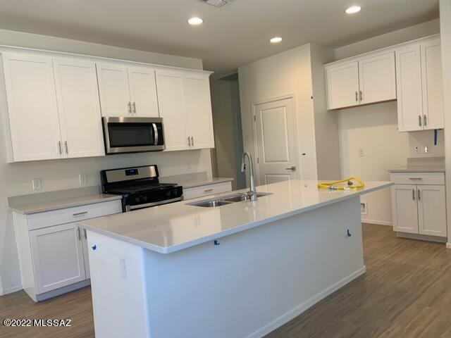 Brand new 3 bedroom home for rent in La Estancia.  Tile flooring throughout main living areas and carpet in bedrooms.  Refrigerator is being purchased.  Dual sinks in master bath with walk in shower. Covered patio in the backyard.  Retaining wall and gravel will be put on property at a future date.  Beautiful pool and playground with splash pad.  Easy drive to Raytheon, Tucson International Airport and Davis Monthan AFB.
