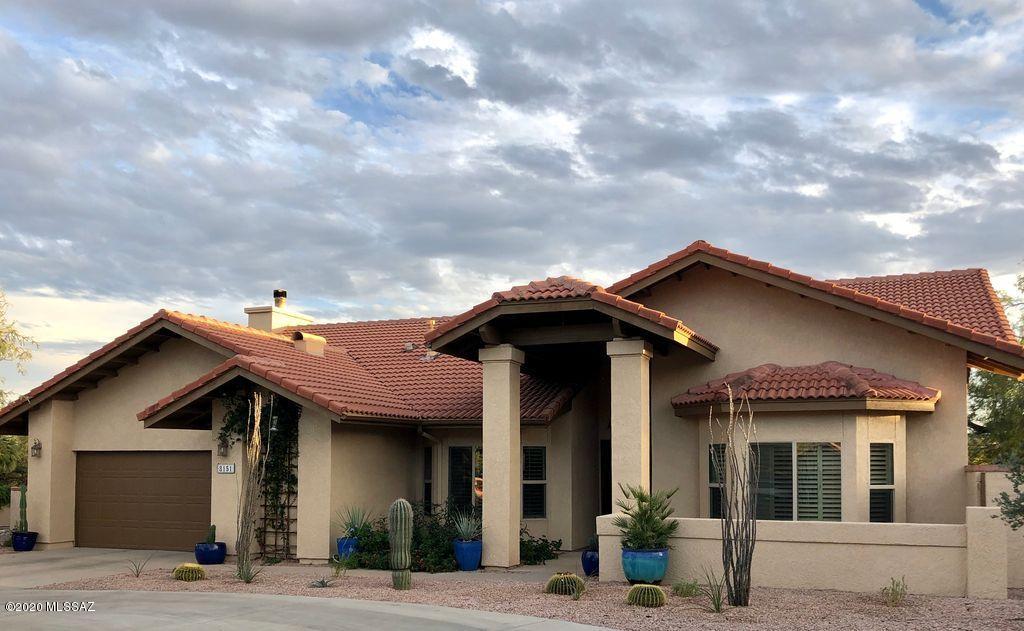 Walk to Sabino Canyon! Highly sought after Sabino Canyon Clusters 4 bedroom 3 bath home. Incredible mountain views, covered back patio, pool and spa. Professionally landscaped back yard with drip irrigation. Outdoor built in grill with granite island. Kitchen has top of the line cabinets, granite countertops and stainless steel appliances. Wood burning fireplace. Fruit trees, soft water system, RO water, newer HVAC, etc. Too many upgrades to mention. A truly special and incredible home!