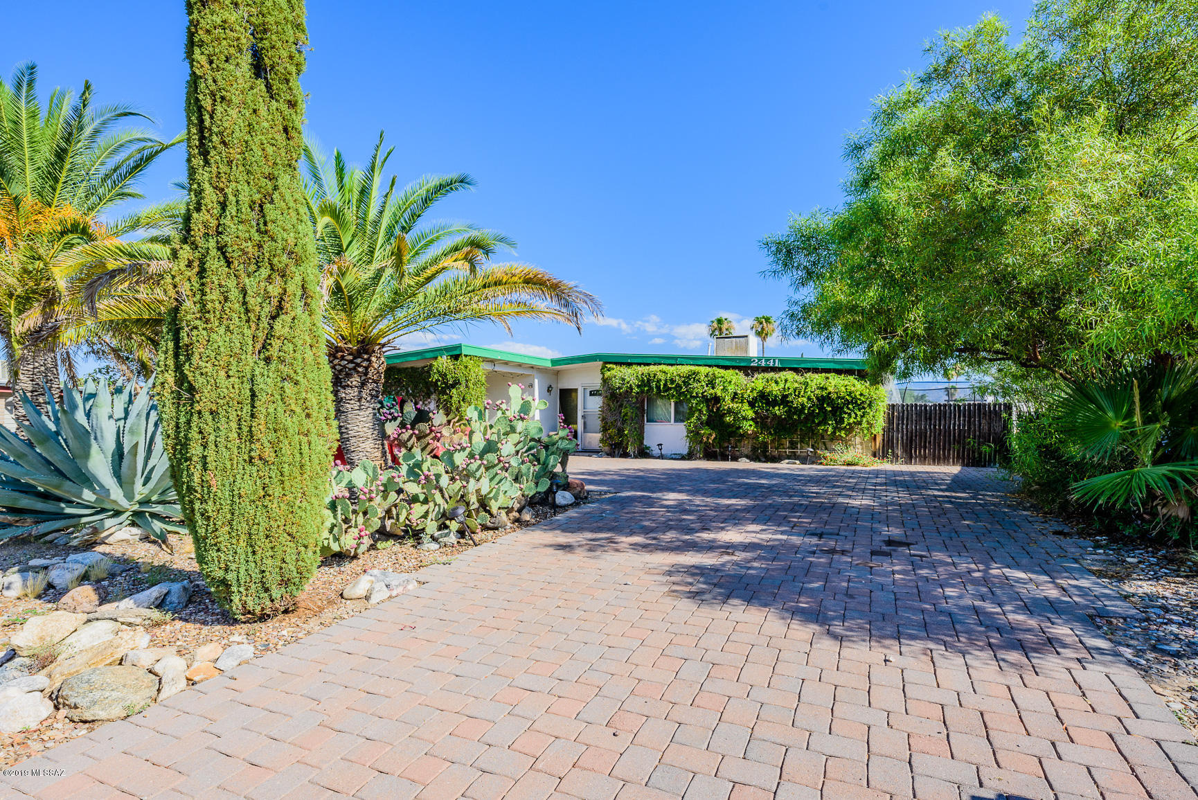 Cozy home tucked away in a quiet cul-de-sac. Tons of natural light with all new recently installed double pane windows. Extended paver driveway has plenty of space for parking. Backyard is perfect for entertaining with its in-ground pool, and extra-long covered patio. No HOA!
