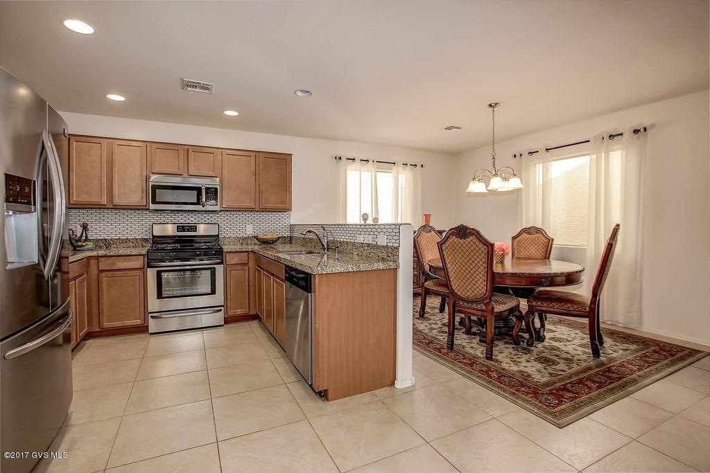 Splendid 2016 Energy Star Qualified Home!! This 1120 sqft with 2bd/2ba/ 2 Car Garage with Open Floor Plan and Ceramic Tile Flooring Throughout, is Better Than New. Enjoy Cooking in The Modern Kitchen With Granite Counters, Stylish Backsplash, Upgraded Cabinets and SS Appliances. Master Bedroom with Walk in Closet. Double Sinks and Walk in Shower in Master Bath. Guest Bedroom Could be Used as Den. All Window Treatments are Included. Almost New Washer and Dryer in Laundry Closet. Upgraded Light Fixtures. Garage Offers Storage Space. Fresh Exterior Paint. This Can be The Perfect Winter Retreat or Enjoy it Year Around. Relax and Take Advantage of All The Amenities that Rancho Resort Offers: Pool, Spa, Rec Center, Library, Parks etc.