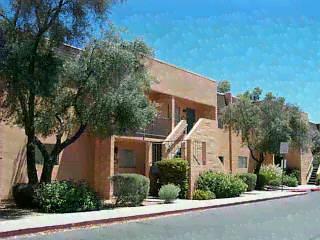 Spacious 2 bedroom, 1 bath condo.  Small rear yard, laundry room off the patio.  Tile and wood laminate flooring.  Complex has nice pool and spa.  Fireplace is decorative only.