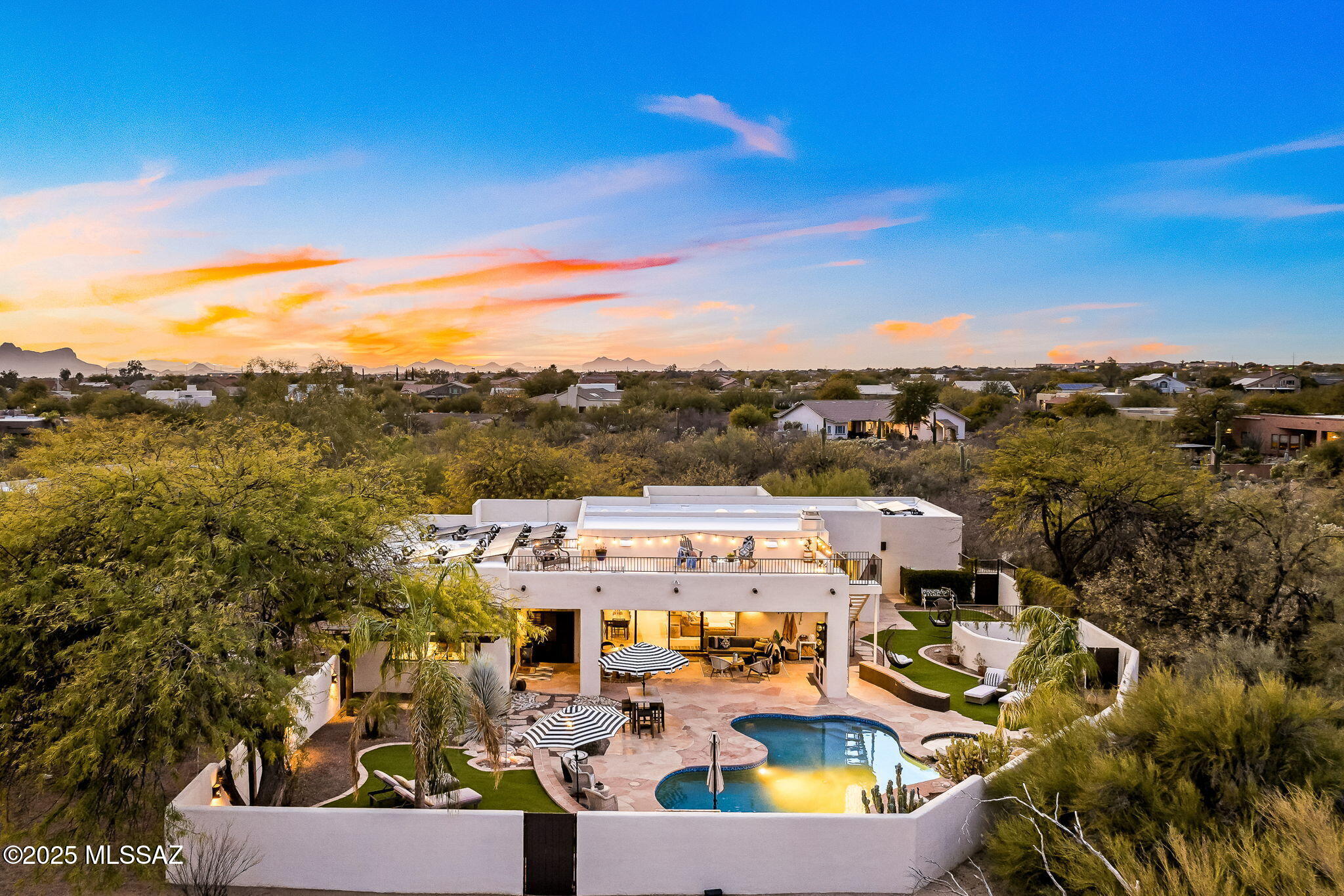 Welcome to this Santa Barbara Retreat
  

Sellers have poured over 100K into this lovely transformation where timeless sophistication blends seamlessly with the allure of the Sonoran Desert. Every detail exudes elegance and warmth, creating a sanctuary of elevated living.  

The heart of this 2,700 sq. ft. home is a gourmet kitchen featuring gleaming quartz countertops, stainless steel appliances, and a charming coffee nook. The light-filled, open floorplan effortlessly merges indoor and outdoor spaces, perfect for relaxation and entertainment.  

Your private backyard oasis boasts a sparkling pool, spa, cascading water feature, and lush, manicured landscaping. Host gatherings at the built-in BBQ or unwind on the rooftop deck with breathtaking mountain views. All of this sits on a sprawling 3.4-acre lot, offering unmatched privacy and tranquility. Close to shops and restaurants and Oro Valley trails and bike paths.