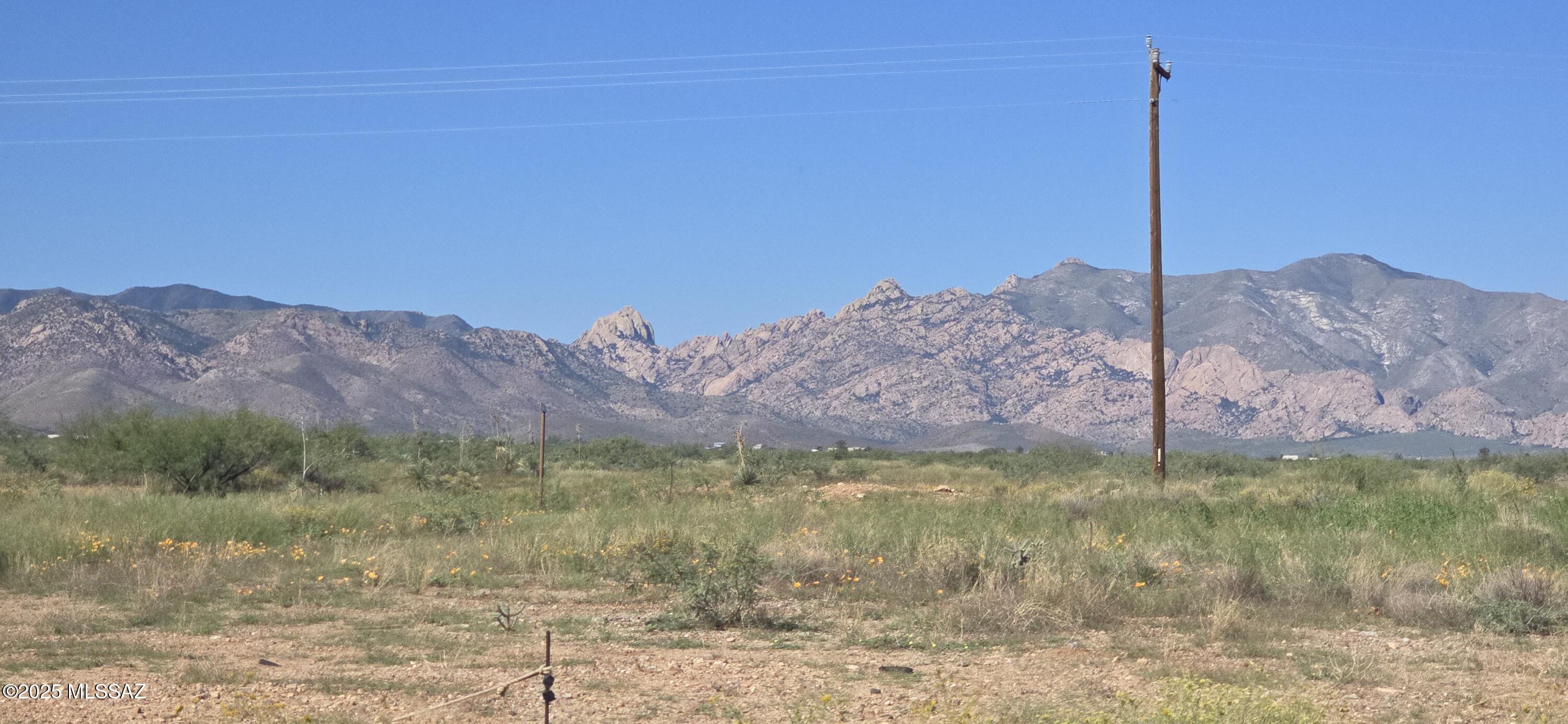 Build your dream home on this .19 acre (approx. 8,276 sq ft) lot in the peaceful Sunsites neighborhood. With utilities already at the lot line, you'll enjoy easy hookup and reduced development time. The property sits in a quiet, low-traffic area with vacant space around, offering plenty of privacy and room to design your ideal southwestern retreat. 
Beautiful views of Cochise Stronghold from property, a popular destination for hiking, bird watching and rock climbing. Enjoy dark night skies in this rural community just 20 minutes south of 1-10.