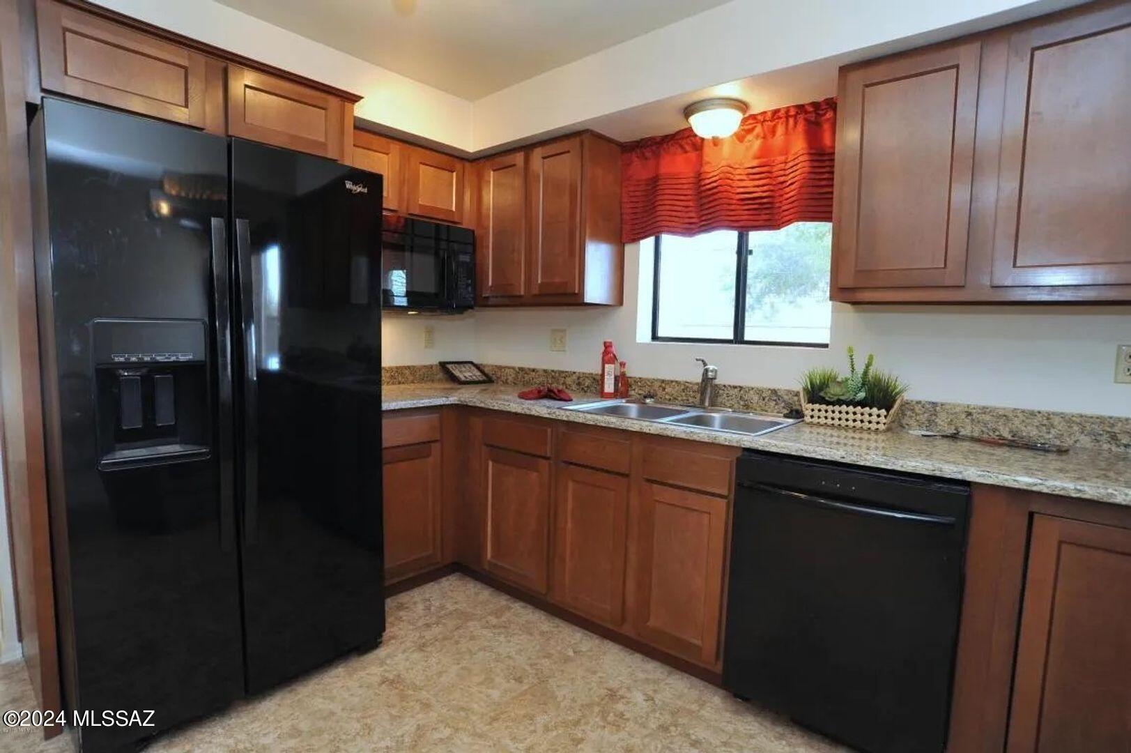 1/2 MONTH FREE ON 12 MONTH LEASE! Home available 3/25/24. 
Introducing our stunning 3 bedroom, 2 bathroom home located on the vibrant Eastside of Tucson, AZ. This charming residence is in the Rolling Hills area near Marshall Elemantary and offers a comfortable and spacious living environment for those seeking a peaceful retreat. The well-designed layout includes a garage for convenient parking and storage. The kitchen features an electric stove, Stainless refrigerator, dishwasher, large counter and custom lighting - perfect for preparing delicious meals. Large living room with extended dining and formal dining space or den space off the kitchen. Separate utilty room for WD. ** Large storgae shed is not accessible to tenants ** Tenants are responsible to water the front and back vegetatio