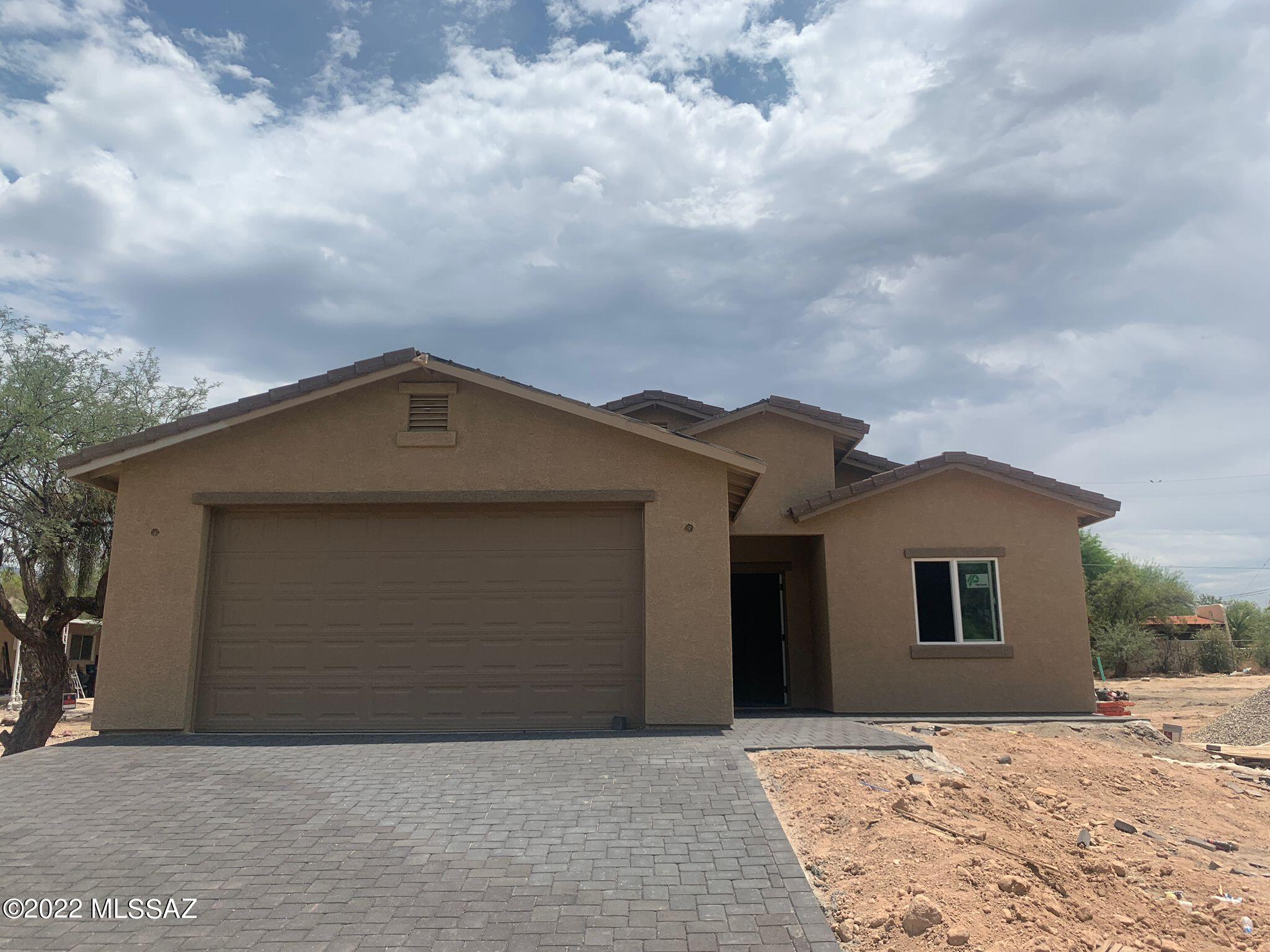 Take a look to this NEW CONSTRUCTION centrally located 4 bedrooms, 2 bathrooms house with a huge backyard and NO HOA. This is a energy efficient house that has a 2 car garage and a large covered patio. It has ceramic tile through the home, granite countertops, beautiful white cabinets in the kitchen and bathrooms, brand new electric range, brushed nickel fixtures, modern paint and LED lighting. A large master bedroom with a walk in closet and a beautiful large master shower. Tile Roof, double pane windows, New A/C unit and water heater. This is a move in ready house that wont last long!! Owner/Agent.