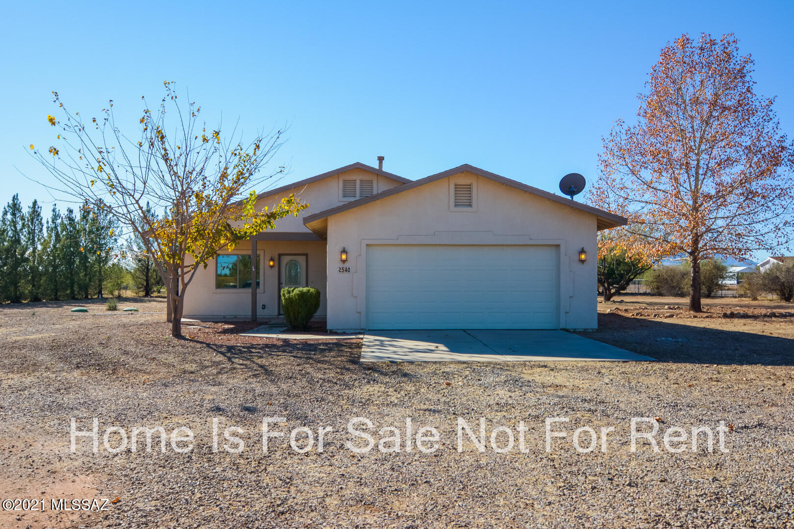 Vacant, sanitized and beautifully remodeled Contemporary style home. Located in a scenic location. Rich wood look luxury vinyl plank flooring. Modern kitchen with stainless steel appliances. Ceiling fans throughout the home. New upgraded carpet and padding. New interior paint. Fenced yard with mature trees. Two car garage. One acre lot. This home shows beautifully.