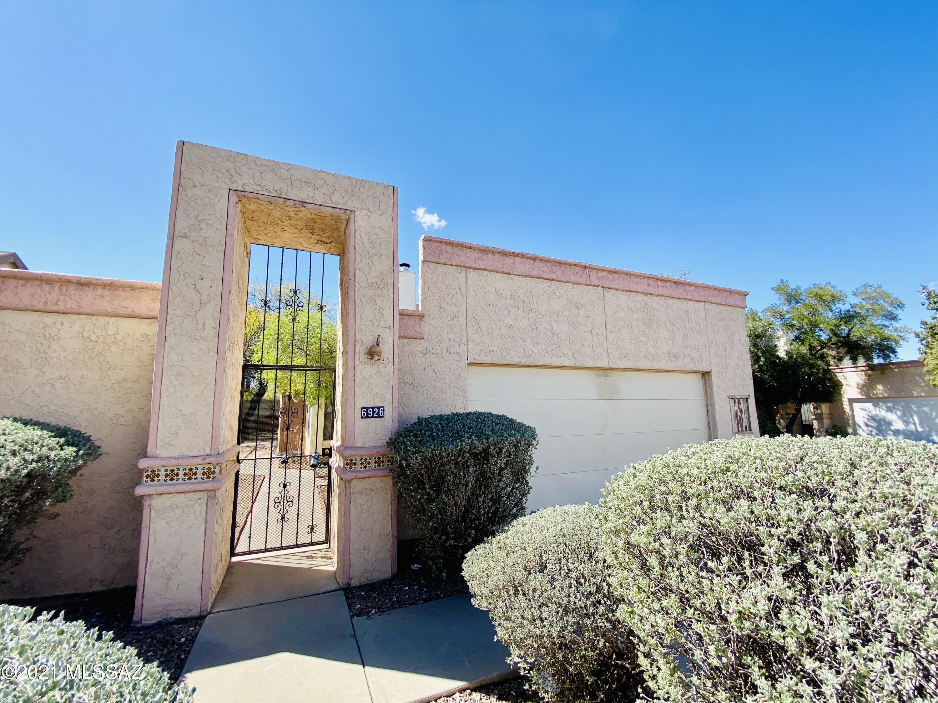 A rare modern and affordable 3 Bed 2 Bath Townhome Located in the legendary Presidio Villas 2 and one of the biggest original floor plans. Features include: Geometric Cathedral ceilings WITH PLANT SHELVES AND CEILING FAN. DINING AREA WITH BREAKFAST BAR WITH COZY FIREPLACE IN THE LIVING ROOM. Low care front/rear nicely landscaped -fully enclosed yard. 2-Car garage/carport with lots of storage.  SHORT WALK TO THE COMMUNITY POOL. Close to elementary school, shopping, restaurants and more.