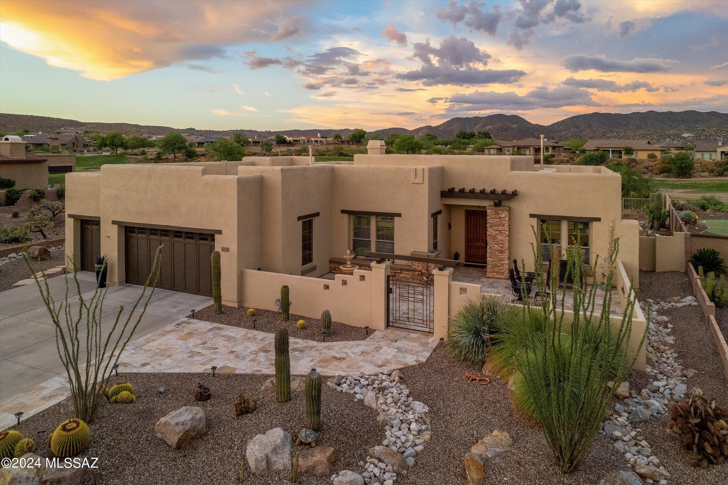 Embrace luxurious desert living at 36269 S Ocotillo Canyon Drive, Saddlebrooke, AZ. This 2,595 sq ft Santa Fe-style gem offers 2 bedrooms, den, and 2.5 baths - perfect for low-maintenance living without sacrificing space. Indulge in your private pool and spa while savoring unobstructed mountain views from the prime golf course lot. The 3-car garage provides ample storage, complementing the open floor plan adorned with Southwestern flair. Saddlebrooke's resort-style amenities, including golf courses, fitness centers, and community pools, elevate your lifestyle. Whether you're retiring, seeking a vacation home, or craving laid-back desert life, this Ocotillo Canyon masterpiece awaits. Experience the pinnacle of Arizona living where comfort meets elegance in a breathtaking natural setting.