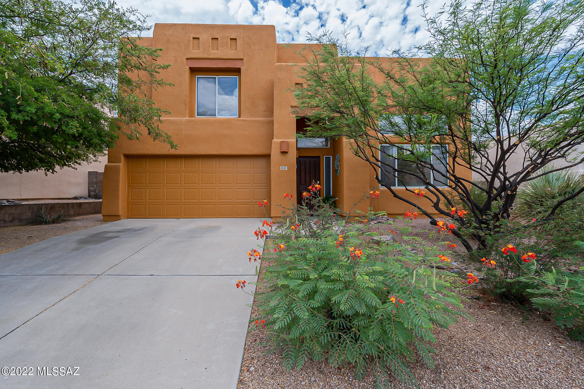 RANGE PRICING $399,500 - $425,000.  Freshly painted inside and out 4 br 2 ½ ba home conveniently located in the sought after Pantano Ranch.  The kitchen boasts granite counter tops with a large island which can also be used as a breakfast bar.  The large formal living/dining area also has decorative niches into the outer wall of the staircase.  The den/family room is currently being used as an office for this bachelor!  Bring your imagination.  The master bedroom is on the main floor with guest rooms on the second.  The 4th Guest Room is HUGE and can be used as a bedroom, den or children's playroom.  Enter the back yard from the dining area to an oversized covered patio.  This is a private back yard with no backyard neighbors.  BONUS ... Leased Solar!