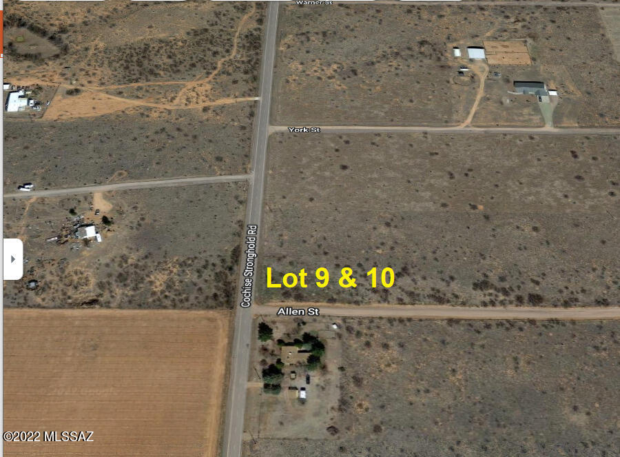 2.14 acres of Corner Property on paved Cochise Stronghold Road and runs along W. Allen Road consisting of 2 parcels 119-05-213 Lot 9 @ 1.07 acres & 119-05-214 Lot 10 @ 1.07 acres.  The Electric runs along the back of these lots on the lot line. There are fantastic views of the Cochise Stronghold/Dragoon Mountain Range. Nice flat parcels with mesquite trees and natural grass in an easily accessible location that would be perfect for building.  Easy access to I-10 & US-191 and only 5.8 miles to downtown Sunsites that has shopping, restaurants, entertainment and more.  Check out the community website at www.sunsitesaz.org