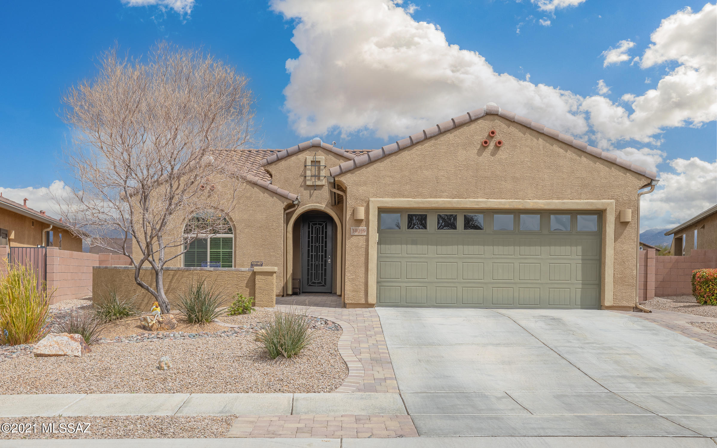 Lovely 3BR/2BA home on a premium ridge lot in Del Webb. Includes granite countertops, custom backsplash and S/S appliances.  Expansive kitchen island is perfect for entertaining.  With no homes directly behind, this home offers views that are not available in most properties. Back yard includes a covered patio, pavers and artificial turf.  All low maintenance and perfect for indoor/outdoor Arizona living or a lock & go winter residence.  The front patio offers a great space to enjoy company or a quiet cup of coffee.