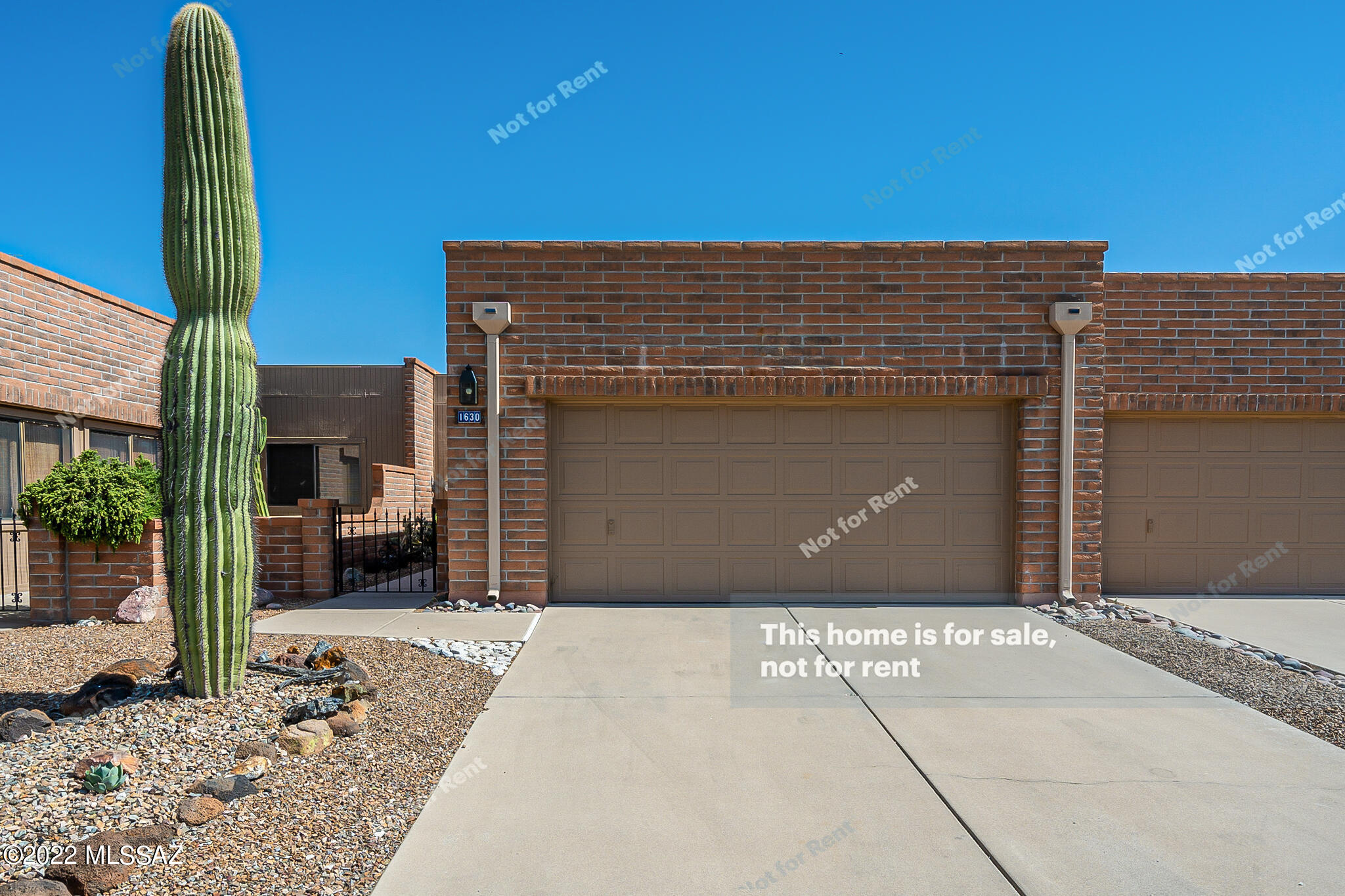 This Green Valley one-story home offers a two-car garage.
