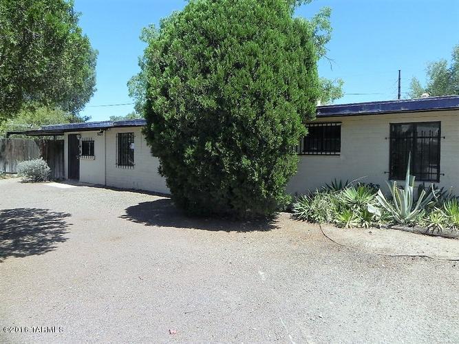 Great opportunities with this three bedroom, two bath home located in midtown Tucson. Established neighborhood. Good floor plan with large living room, bright kitchen, and bonus room for storage or a workshop. Home is located on a cul-de-sac for additional privacy. Low maintenance opportunities. Come see today! ! This is a Fannie Mae HomePath property. First Time Buyers, complete the HomePath Ready Buyer Ownership Course. Attach certificate to offer and request up to 3% closing cost assistance. Ask Agent for more details. Restrictions apply.