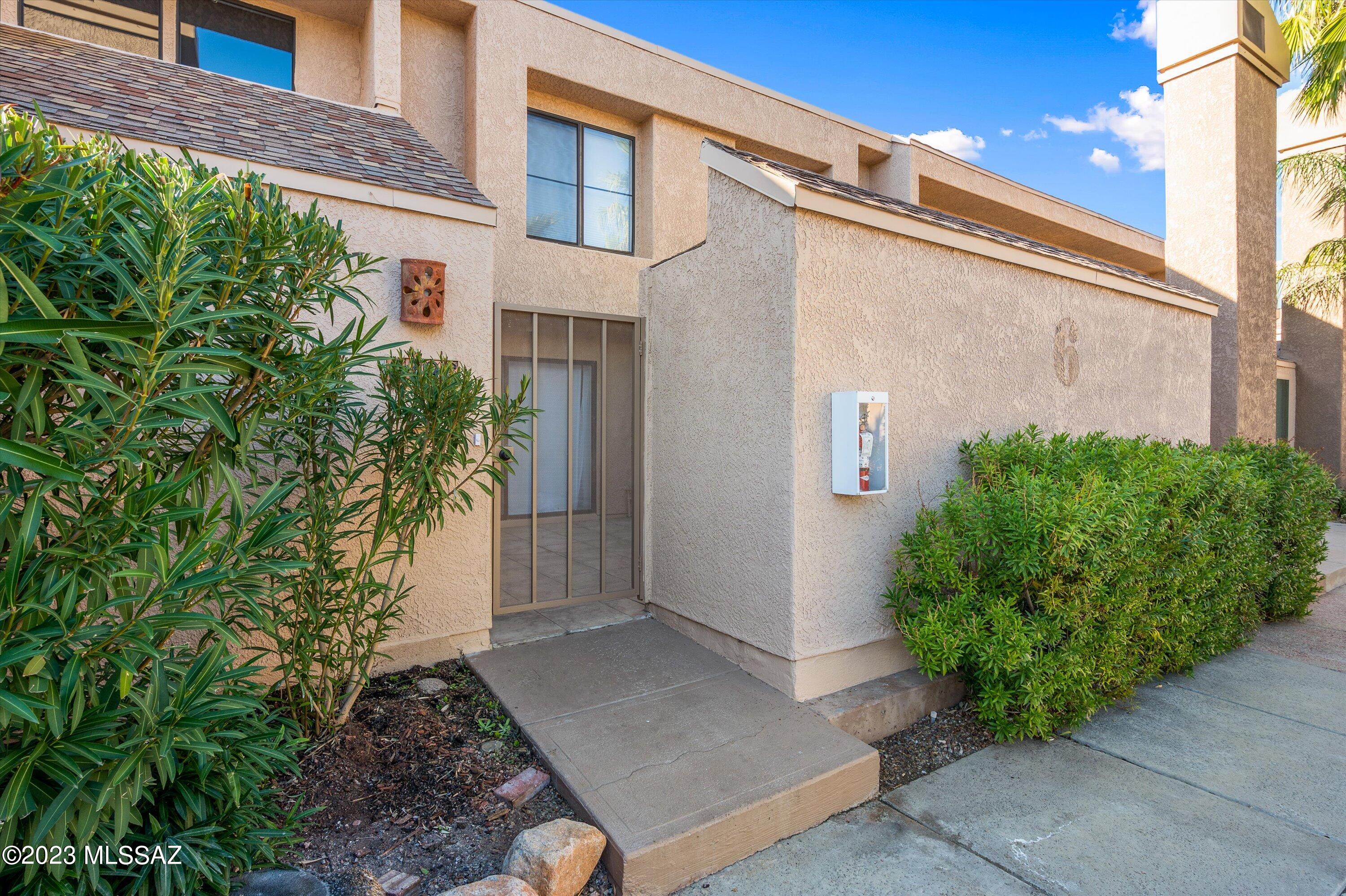 Low maintenance Foothills living at its best in the gated community of Dakotah Hills. 2BR+Loft/2BA, 1409 sqft condo feels like a townhome. There are no units above or below you. This updated two-story unit includes a private courtyard entrance, Great room concept floorplan with vaulted ceilings and large windows with remote controlled window shades. NEW highly upgraded 18 seer Bosch HVAC with app-controlled programable thermostat, NEW water heater, NEW matte black fixtures and lighting, NEW stainless steel kitchen appliances, NEW washer and dryer and NEW interior paint. Lower level features the Great room with fireplace, dining area, kitchen, breakfast bar, a spacious bedroom with walk-in closet and sliding door to the courtyard, a bathroom with a tub/shower combination & laundry area. The upper level features the primary bedroom with walk-in closet, bath with double vanities, custom walk-in shower and the loft overlooking the Great room. The community offers a heated pool and spa plus there is a locked pedestrian gate which takes you directly into the Bel Air shopping plaza. Easy access to multiple restaurants, banking, a salon, nail shop, bakery, frozen yogurt, ACE Hardware and many more shops.  Washer, dryer and refrigerator convey with the sale. All you have to do is move in and enjoy.  See the floorplan with dimensions in the documents section.