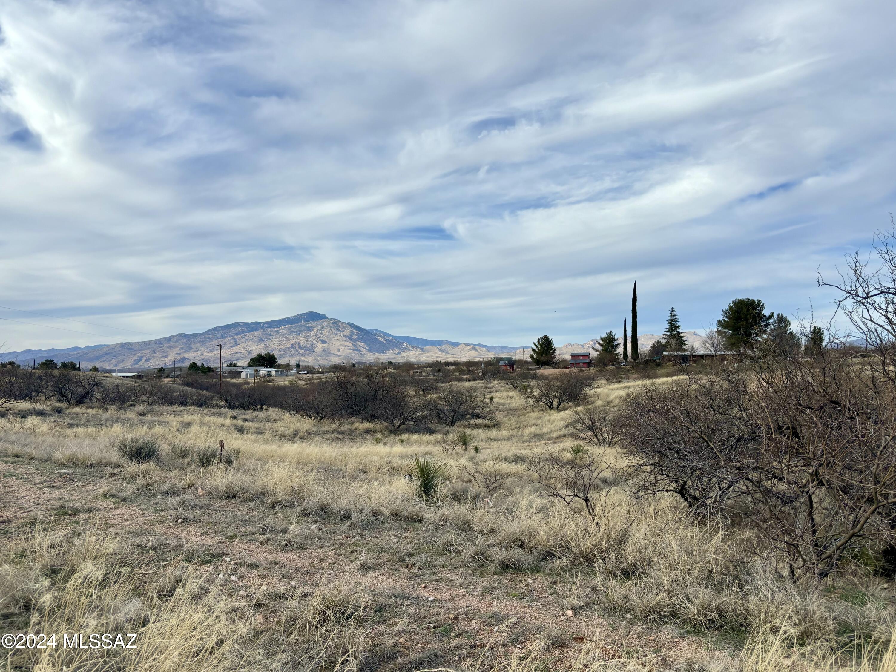 Discover the canvas for your dream home in this serene 1.248 acre lot located in a prime location nestled between the Whetstone and Rincon Mountains overlooking the San Pedro Valley. 360* MOUNTAIN VIEWS, AMAZING ARIZONA SUNSETS & SUNRISES allow you to embrace the tranquility of nature while enjoying convenient access to I-10 and amenities. Elevated in the high desert with cooler summers and located in the within the Vail School District, this spacious lot offers endless possibilities for creating your ideal living space.