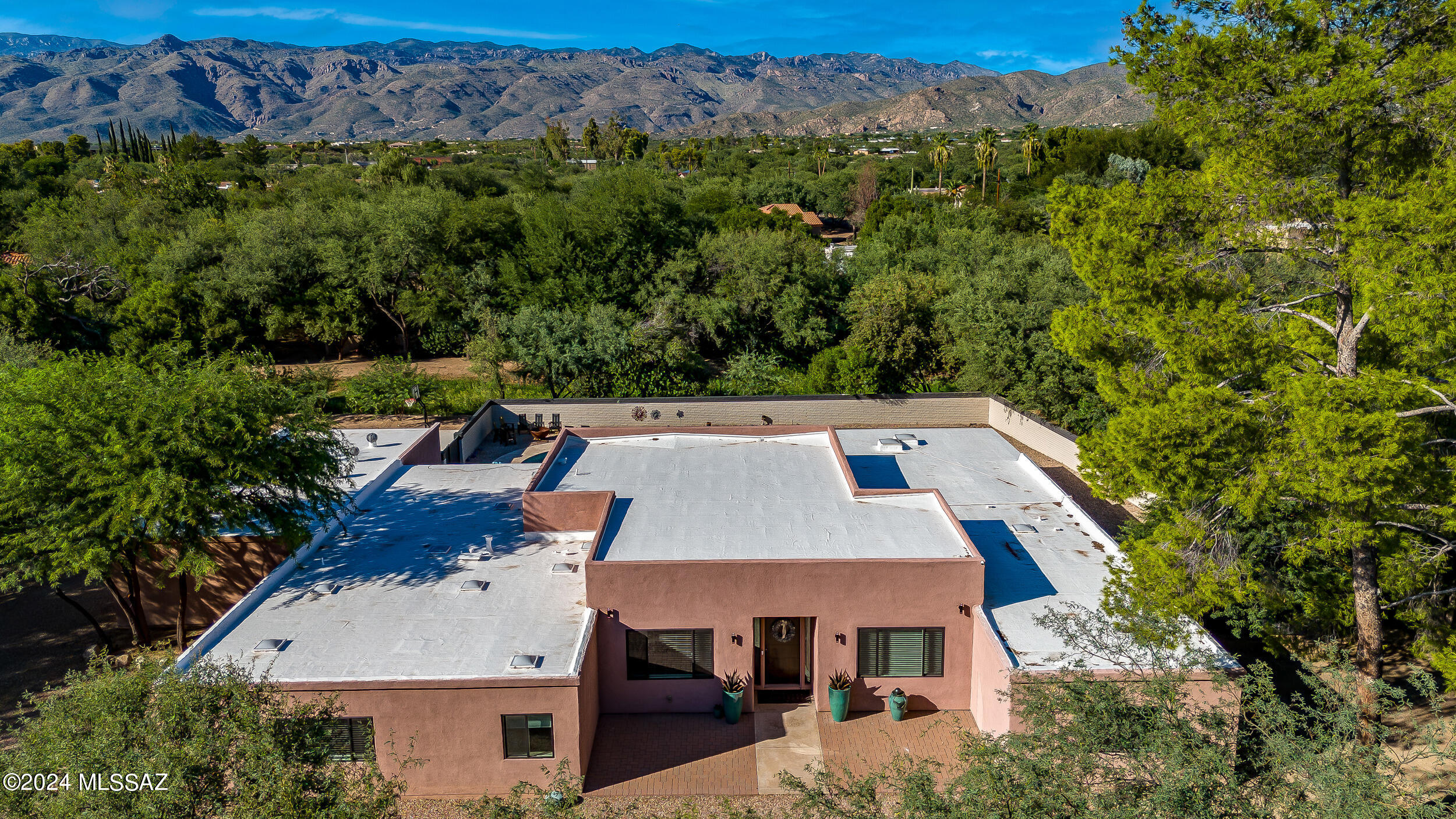 Stunning property located in the highly desirable 49er's Country Club. Bright & spacious split bedroom floorplan with Greatroom concept. This home offers tons of versatile space including 4 huge bedrooms plus a den/office, Rec/Movie theater room, and space for formal dining or family room. Separate 4th bedroom could be optional guest quarters/2nd primary suite. Gorgeous kitchen with multicolored shaker cabinets, huge island with sink, double ovens with separate cooktop & pot filler, and wine fridge. Polished porcelain tile throughout. 8' multi-sliding glass doors overlooking north facing rear patio, sparkling pool, & green grass. So many features including concrete basketball court, heavy duty custom metal gates, whole home water filtration, newer HVAC, & so much more. A true must see! must see!
