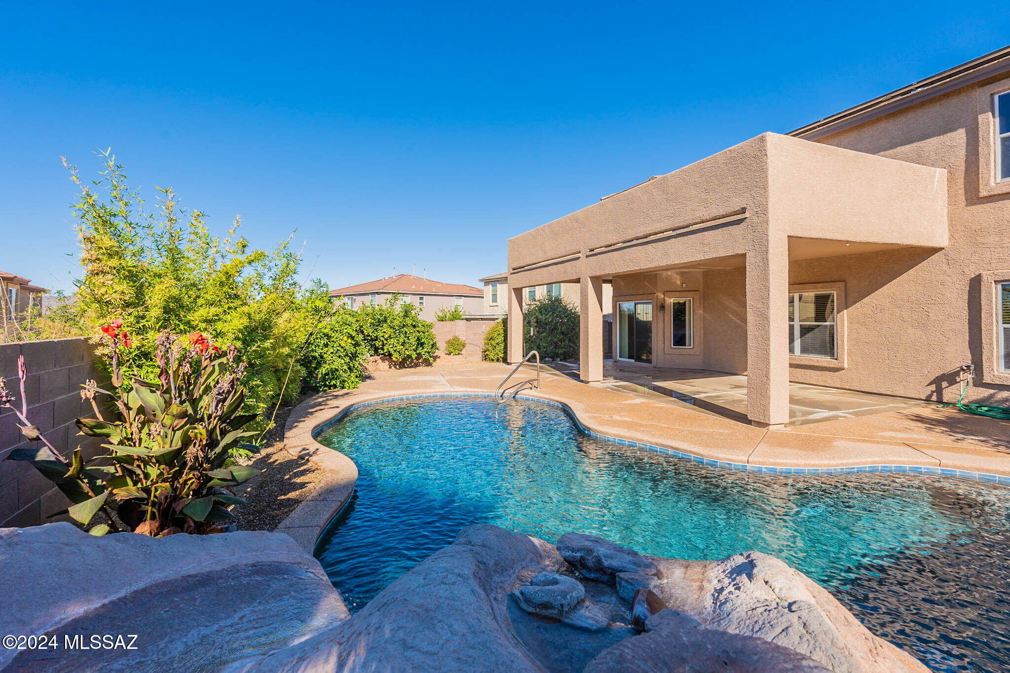Black Horse Ranch Community, A 2886 square foot home, Great home with plenty of room. There are mountain views from the pool and spacious patio as well as the upper deck in the park like backyard. Ideal home for entertaining. Enjoy this 2 story 4 or 5 bedroom home with 3 bathrooms.  There is a private downstairs suite with a bedroom, bath and sitting area. Wonderful chefs' kitchen with Corian countertops and all stainless appliances. There is a three-car garage with storage. Refrigerator, Washer and Dryer convey. Come see this great home.
