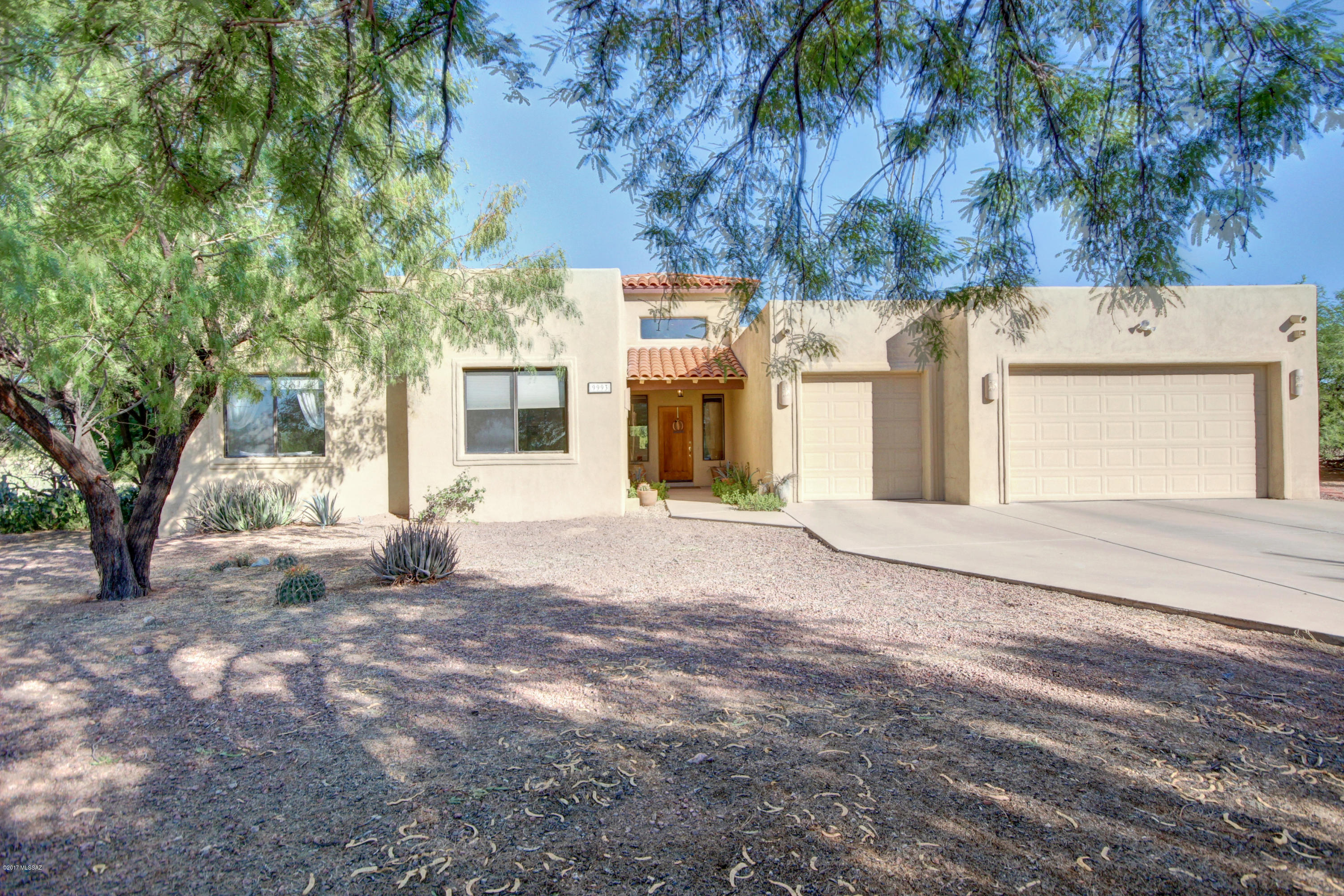 Outstanding 5 bedroom, 2.5 bath home with 3 car garage, sparkling pool & spa, grassy play area, and breathtaking Mountain Views! Soaring ceilings, soothing palette, plush carpet, upgraded lighting, beautiful tile floor, cozy fireplace, and lots of natural light throughout. Fantastic chefs kitchen features center island, granite counters, black appliances, breakfast bar, desk area, and plethora of wood cabinetry. Bay window in breakfast area, skylights, and ceiling fans. High ceilings.  French doors to covered patio. Perfect Home for entertaining inside and out! Generous size bedrooms, ample closets, and attached cabinets in garage. Built in speaker system, plumbed for central vac. Peaceful, private lot in a cul-de sac. Perfect location for pets or children. RV space available. No polybutylene!!!!!   Pool table conveys.   Workshop space available.