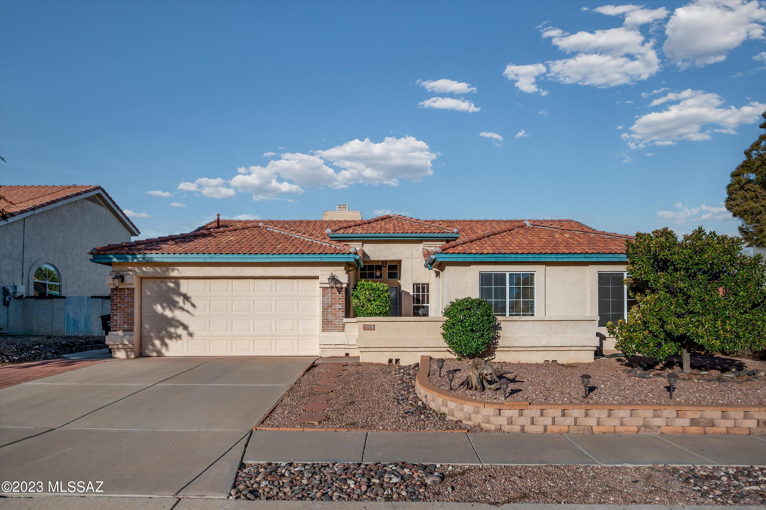 Great Eastside Location!  Open & bright floor plan in this 3 bedroom plus a den, well maintained original owner home.  Spacious great room w/cozy wood burning fireplace opens to large covered patio which overlooks the large landscaped back yard.  Kitchen w/bright breakfast nook also opens to patio.  Backyard is perfect for year round Tucson living, dine on your patio while taking in the mountains & sunsets!  Large primary bedroom with 2 closets & remodeled bath w/dual sinks & large tiled shower. Den can be converted to 4th bedroom.  All appliances stay.  2 Car garage with loads of cabinets.  No Poly!!  Secluded Eastside neighborhood within walking distance to Case Park.  Convenient location, close to schools, shopping & restaurants.  Fountain in backyard conveys ''as-is'' pump doesn't work