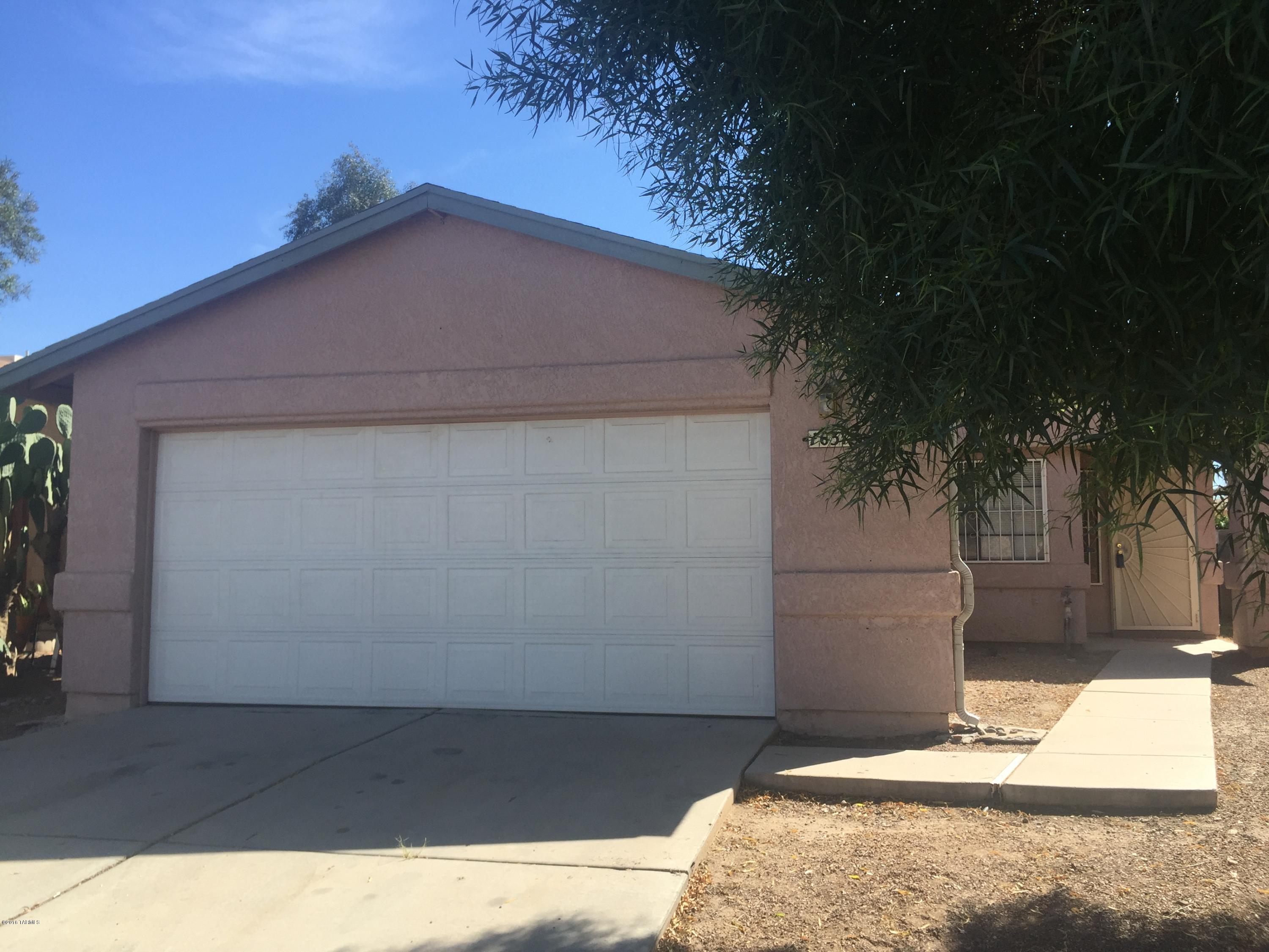 Awesome home in desirable Midvale Park! Sensible floorplan - Tile floors in great room, dining, kitchen, hallway and baths.  Bedrooms have new neutral carpet and ceiling fans. A/C/Heater installed in 2012. Kitchen window looks out to large covered patio. Side-by-side fridge and super kitchen layout with plenty of counterspace make cooking fun! 2-car garage opens to hallway - easy to bring in grocercies! Midvale - close to everything!  Shopping,