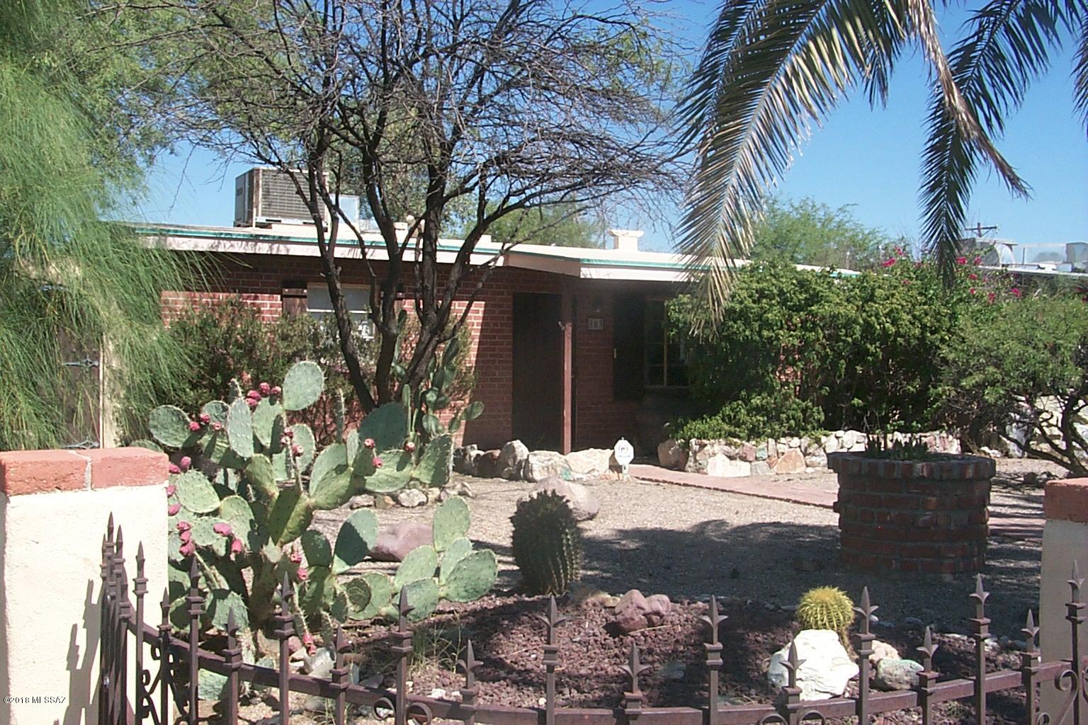 Solid 3 bedroom/1 bath main house. Large kitchen, split bedroom plan.  
Guest house has one HUGE bedroom that should be converted to two bedrooms to fetch more rent.  Close to university! Rents are below market rents.