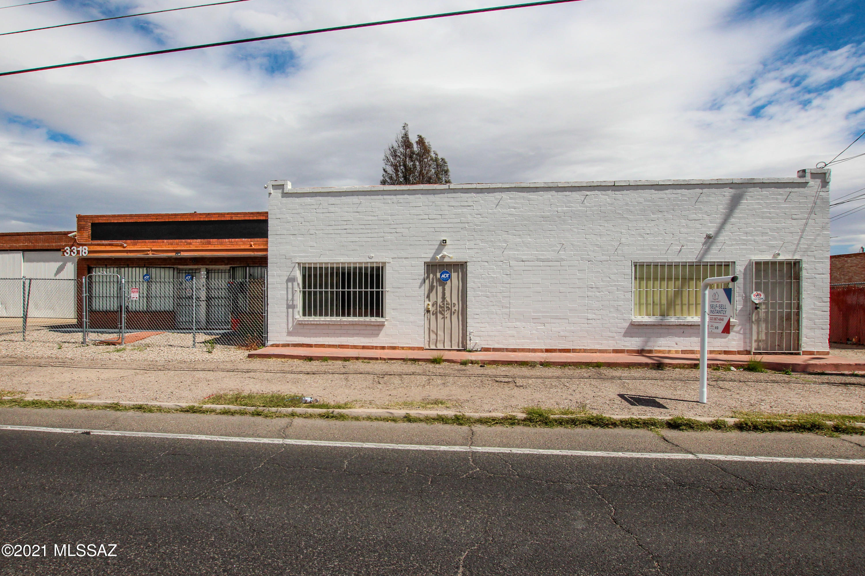 Centrally located C-2 property that is close to the UofA and minutes from the I-10 freeway. This Property Includes four units 3314, 3316 & 3318 N. 1st.  Ave. which allows for many uses such as Contractor Offices w/ Yard, Art Studio, Band and Music Recording Studio as well Retail Showrooms. Lots of room for parking behind building. 1 Bedroom Apt (3314) Is Rented and needs some notice for showings, apartment can be available after purchase. Property has a large fenced storage yard perfect for contractors. This property is suitable for a variety of businesses. This property can be used for industrial as well as retail.  Property is also set up for a work/live opportunity.