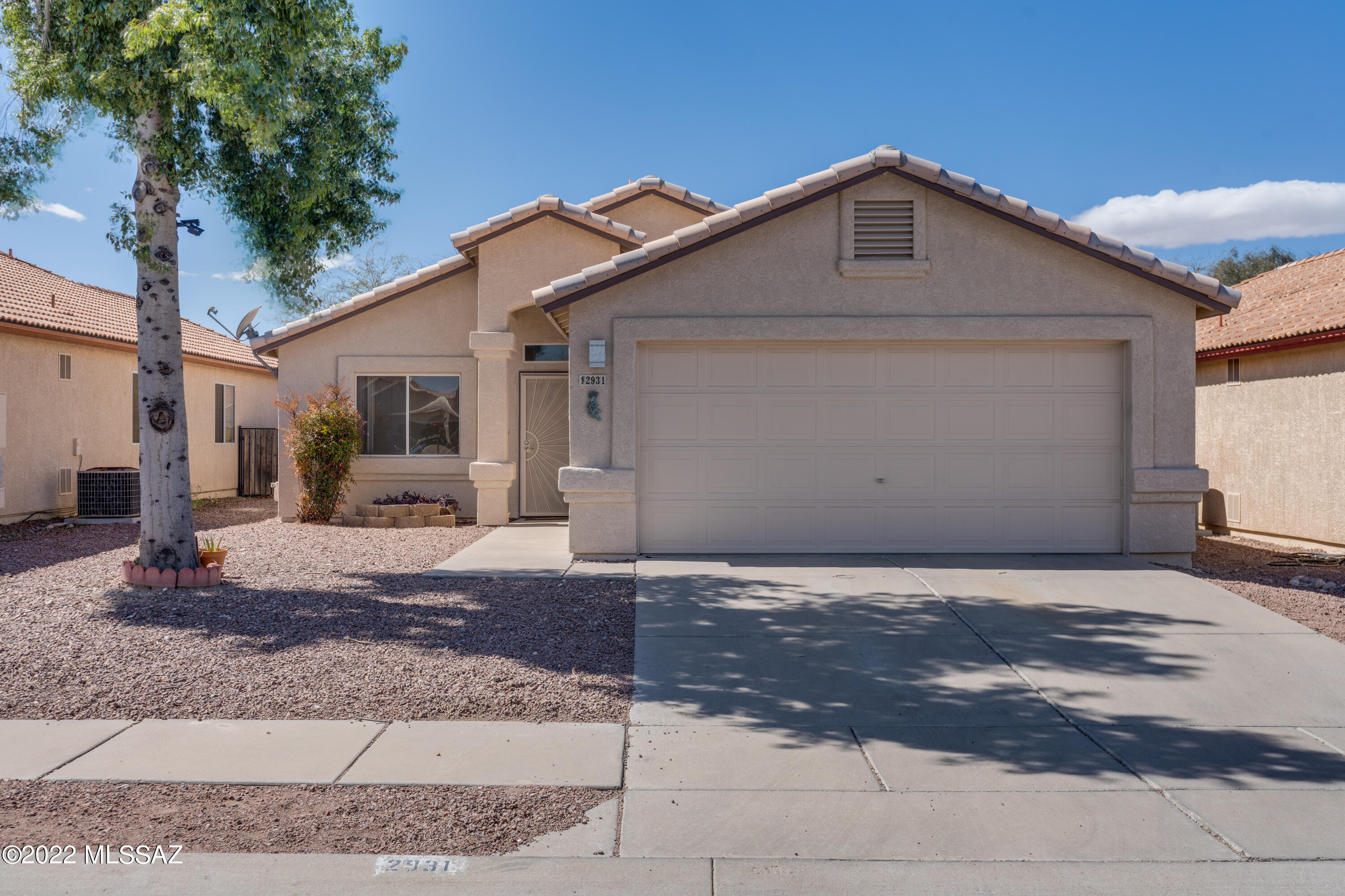 Charming 2-bedroom, 2-bathroom home in West Tucson with close proximity to I-10, Downtown and the University of AZ. This home boasts tile throughout with no carpet and ceiling fans in all rooms. Control the heating and cooling through the smart Nest thermostat. The back yard is a blank slate but has plenty of room to make it your personal oasis and it backs up to common area. The exterior of the home was painted approx. 2 yrs. ago. Security cameras WILL NOT convey with the sale (not attached). The frig, washer and dryer convey with the sale.