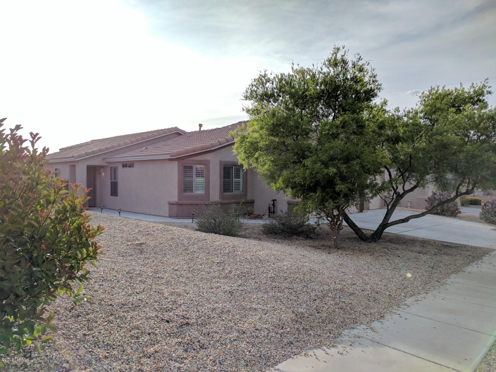 This home is pristine and ready for you to move in!  Full of upgrades; all appliances; mature vegetation including a ruby red grapefruit tree; and NO carpet!  Three-car garage; master bath with garden tub; kitchen with reverse osmosis system and stainless st4eal appliances with gas range.  Front load high efficiency washer and dryer.  The 4th bedroom is off of the great room and could be used for a den!  Landlord prefers NO pets.