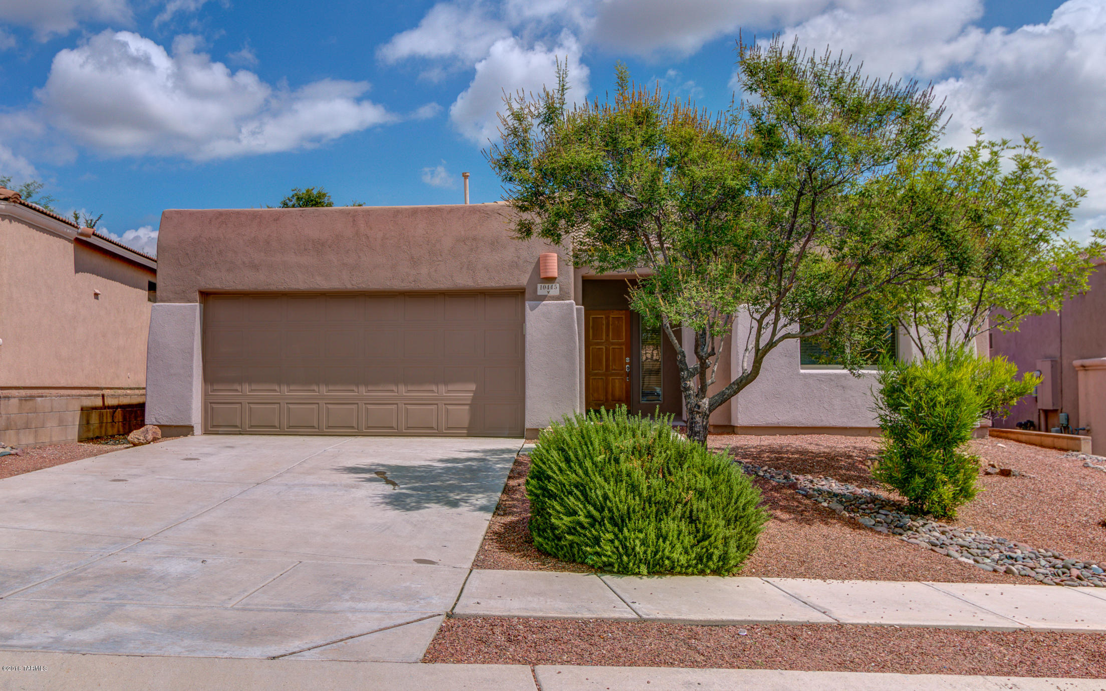 Must-See this Rancho Del Lago Home, 1,805 sq ft, 3 Bedrooms and a Den with an Energy Efficient SOLAR System! The garage has a 2 foot extension. BRAND NEW carpet in the bedrooms and family room. FRESHLY painted interior and exterior. Spend happy times together in the open concept kitchen and family room with a stunning TV/Media built-in. Relax in the Master Bedroom with all your must-haves…en suite bath with garden tub, large separate shower & dual sink vanity. Includes water softener and R/O system. Enjoy the covered patio and fenced back yard. In the Award-Winning Vail School District!