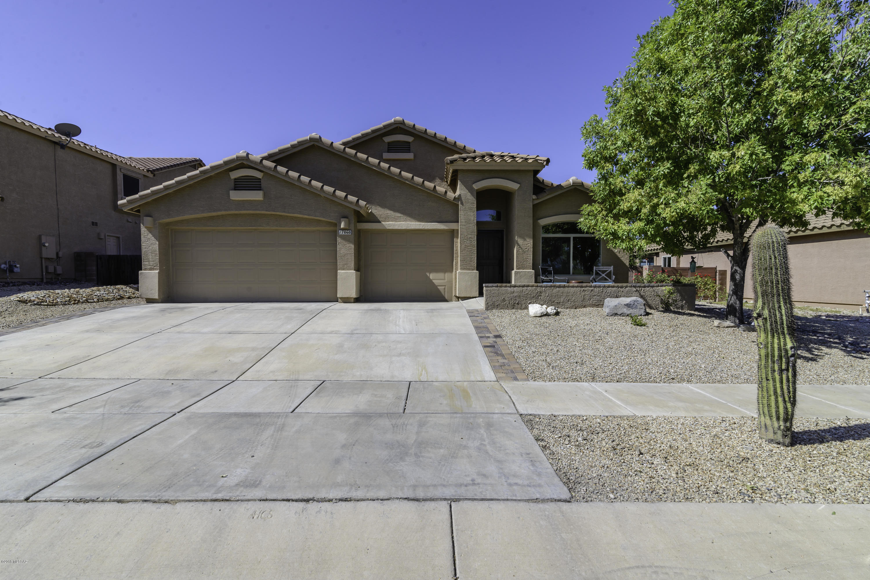 List Range Pricing: Seller will counter or accept offers between $249,900-259,900. This beautiful, single level, CLEAN  move-in ready home in desirable Sycamore Canyon is waiting for you! USDA eligible & in eligible area for up to $20k in FREE MONEY through P2P DPA. This 3 bedroom home plus den can easily be converted to a 4th bd. Oasis like backyard-fully landscaped w/ grass,trees,palms,roses,rock & Pavers, Plus dog run, Large Shed, Landscape Lighting, Spa pad/hook up, already plumbed to add a built in Gas Grill, Covered Patio & Private Gate to a walking path behind the home. Great lot w/ no neighbors behind or directly in front of you, plus the road is near a quiet cul-de-sac. This home has been meticulously cared for and shows like a model so hurry before its gone! Click MORE for adtl!! You will LOVE this community- The Park is 2 acre grassy field plus playground, Ramada's and Barbecues, Community Pool & Basketball Courts just a short walk up the street. Newly built elementary in community plus your located within one of Arizona's best school districts, the Vail School District. Plus lots of amazing Community Events like Annual Block Party, Hayrides, & much more!
This beautiful home features lots of windows & natural light, two separate living areas, soaring vaulted ceilings, nice neutral updated tile and recently painted interior, ceiling fans and updated fixtures throughout home. Exterior recently painted as well as back fence. Outdoor lighting to front patio, spa pad and landscape lighting has been added!
Master bedroom features large walk in closet with beautiful view of your peaceful backyard. Master bathroom features spacious shower, toilet in separate room, dual sinks and door which leads to the patio. 
Kitchen features gas stove, large island/breakfast bar, beautiful backsplash, recessed lighting & walk in pantry. 
Perfect front patio great for mountain & city light viewing! Backyard has great mountain and desert views. 
3 Car finished garage with epoxy flooring. Large laundry room with added cabinets. Wrought Iron Dog Run area and large custom built storage shed is a huge bonus!