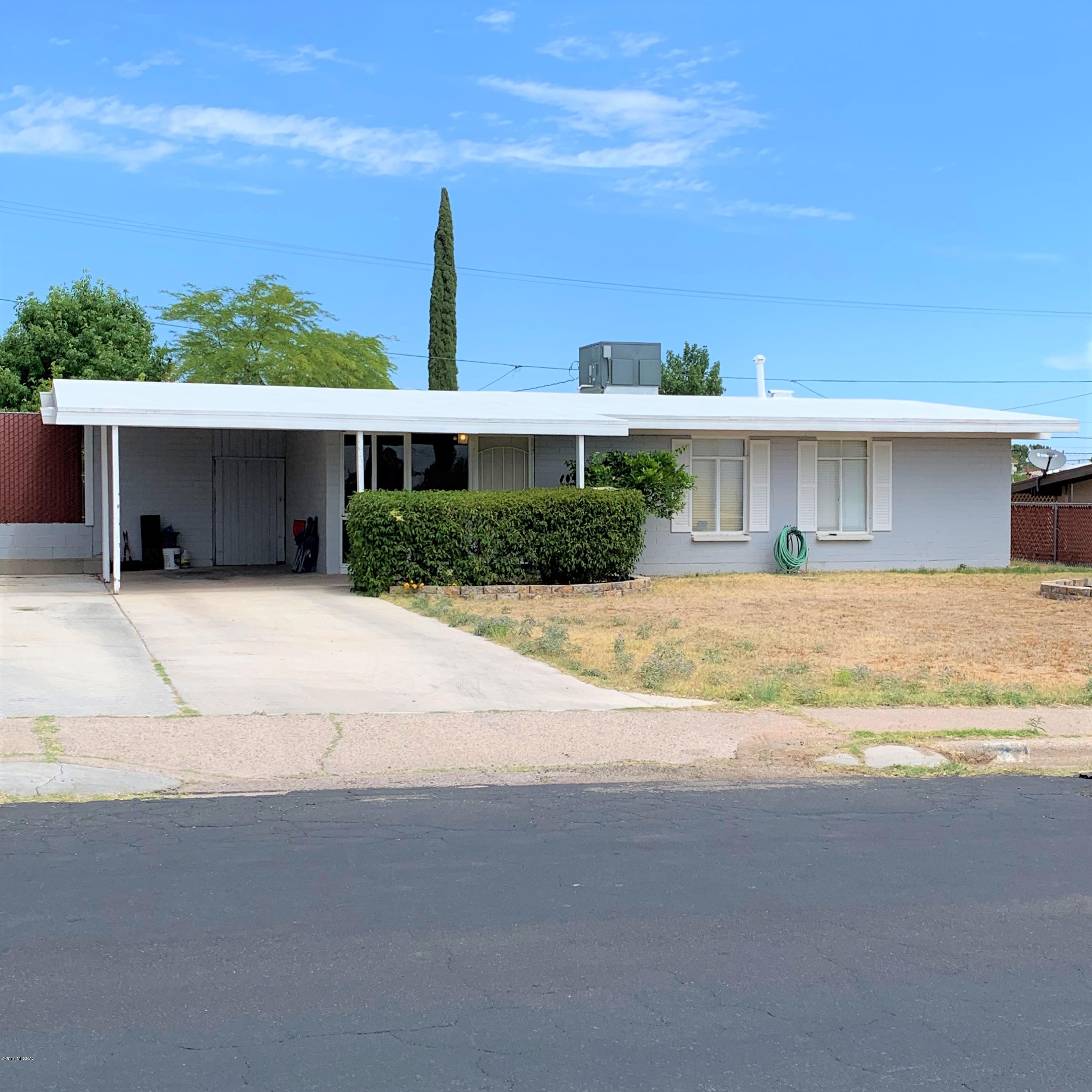 This lovely home has excellent curb appeal. Would make a great investment, centrally located in nice neighborhood,  includes many desirable features included well kept fenced backyard with fruit trees, stainless steel refrigerator and oven, 18'' tile floors throughout, fairly new AC unit. The living room has been expanded but 3rd bedroom can easily be converted back.