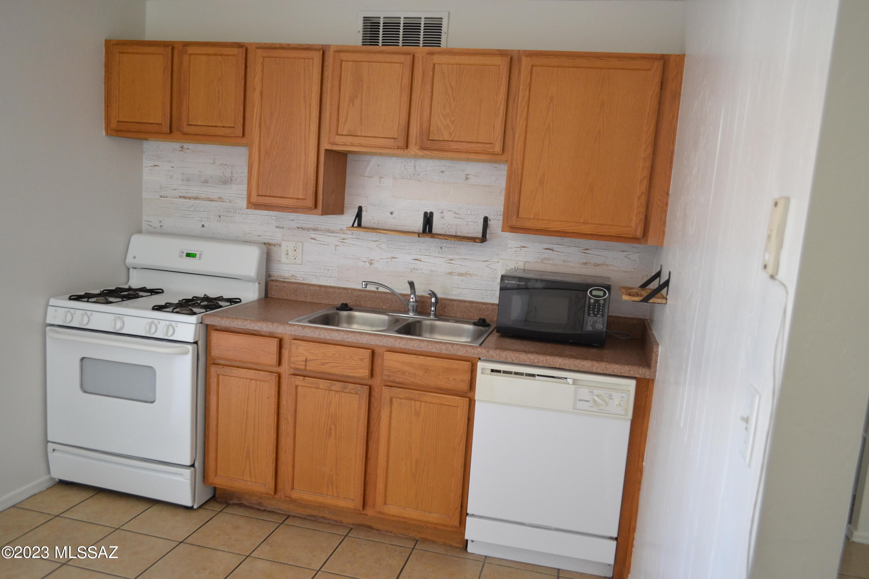 Sunset Foothills Condos (1-201) - Residential Lease