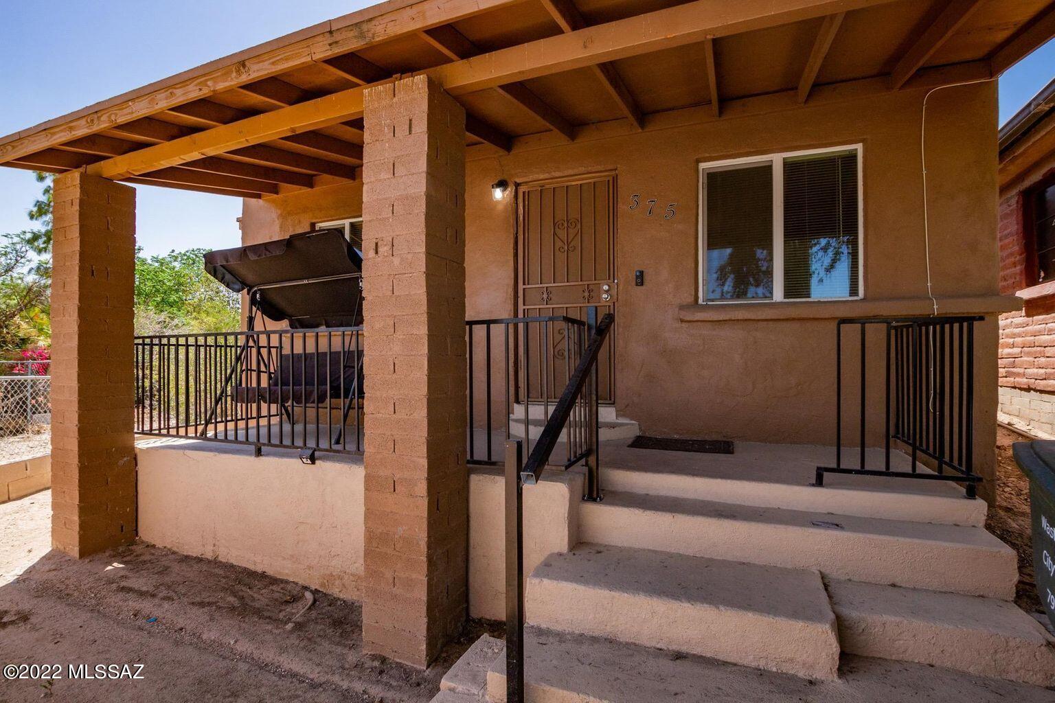 Charming Triplex. Front house is 3BR 2BA with ample closet space, updated baths and interior laundry area. Private enclosed yard with lots of possibilities. Two one-bedroom units are at back of lot. Two units in back are currently rented and occupied.