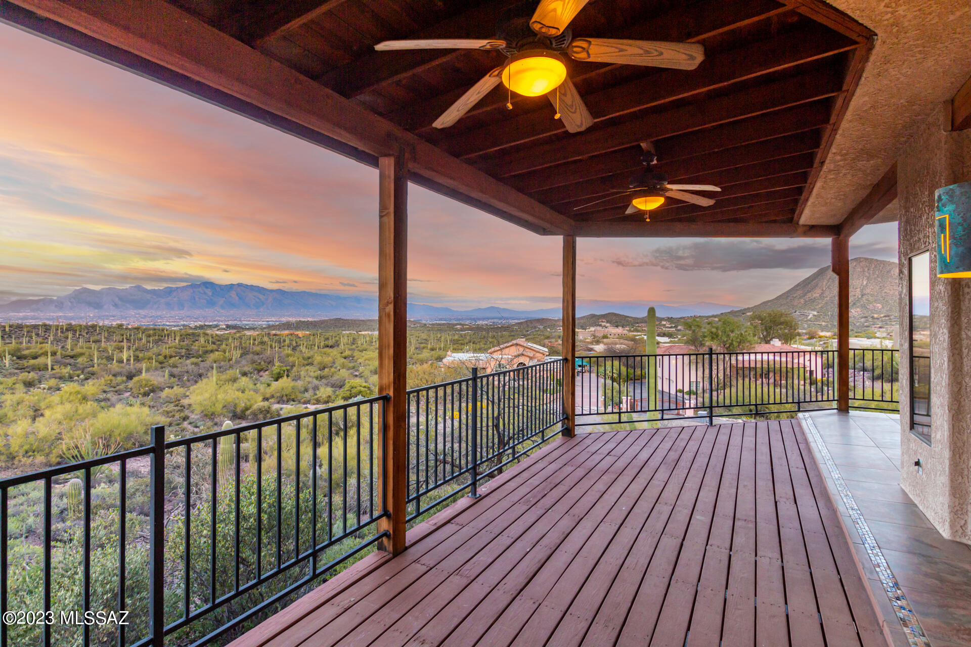 Enjoy this Tucson Gem with breathtaking views from this 1.17 acre hilltop lot! Spectacular sunsets and city lights plus beautiful wildlife just outside your door. This home boasts a Gourmet kitchen, granite countertops, large walk-in pantry and a center island. Windows throughout to enjoy the beautiful scenery. Breakfast nook surrounded by windows. This home is a multilevel with a room and half bath as you enter from the two car garage. Lower level off the top loft includes family room with fireplace. Living room off the kitchen also includes another fireplace. New paint and carpet . Too many features to list them all. Come see this Beauty today!