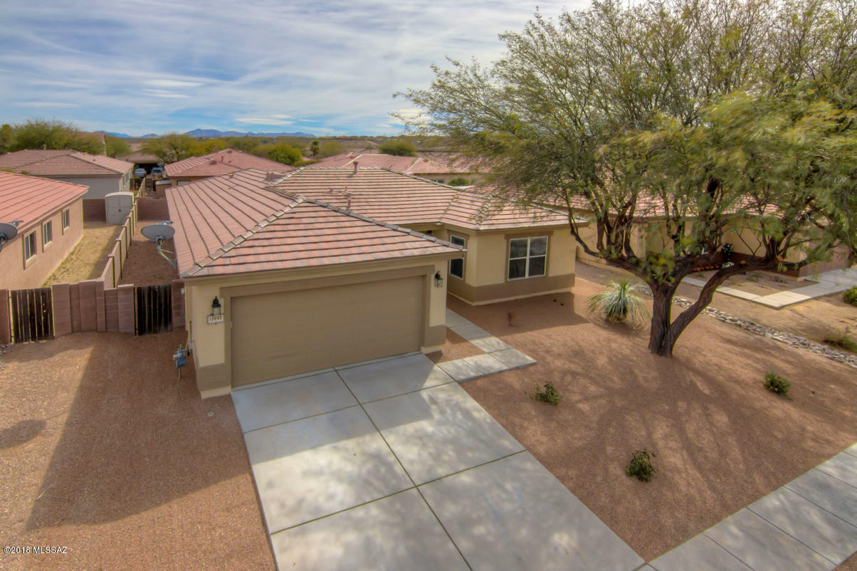 Nicely Updated 4 Bedroom 2 Bath Home located in the Rancho Del Lago Golf Community and Award Winning Vail School District. Ready to Move In with 2045 SF Freshly Paint, Remodeled Kitchen and Baths, New Fixtures, Hardware and Granite. New Laminate Flooring and Ceiling Fans Throughout. Large Open Great Room with Dining Area and Access to Rear Patio, Upgraded Kitchen with Dining Nook, Granite Counter Tops and Island, New Stainless Appliances including Gas Range and Pantry. Master has Large Walk-in Closet and Updated Master Bath with Dual Sinks.