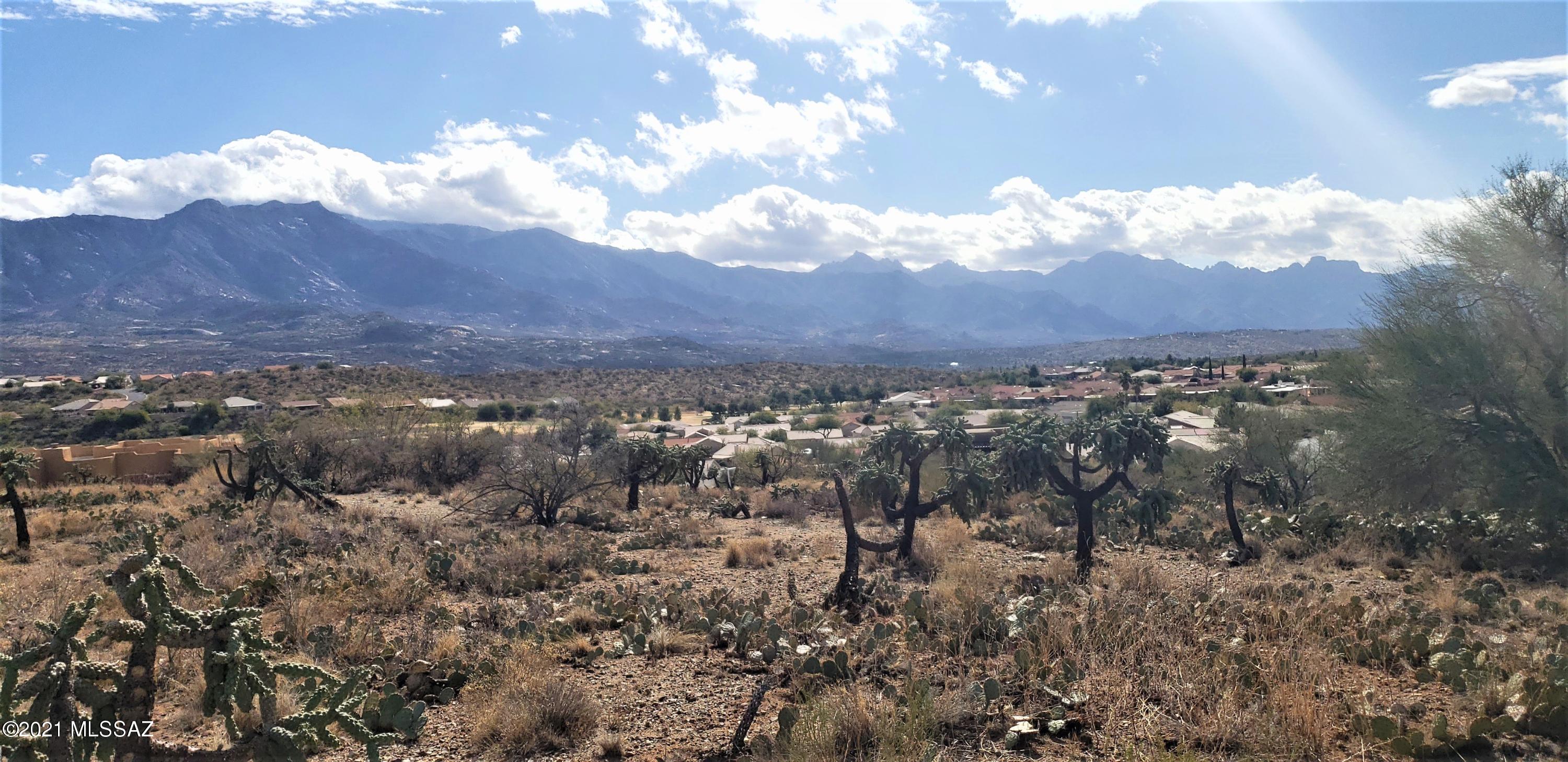 This lot is zoned CR-1A in Pinal County. This one faces the mountain range to the east as well as the unobstructed, long distance views to the south. Beautiful hilltop location. Easy building site with lots of topsoil for a successful perc test to approve your septic system. Water, electric and telephone to the lot line. This lot sits 10+ feet above the road with an gentle rise from the road to the building pad area.