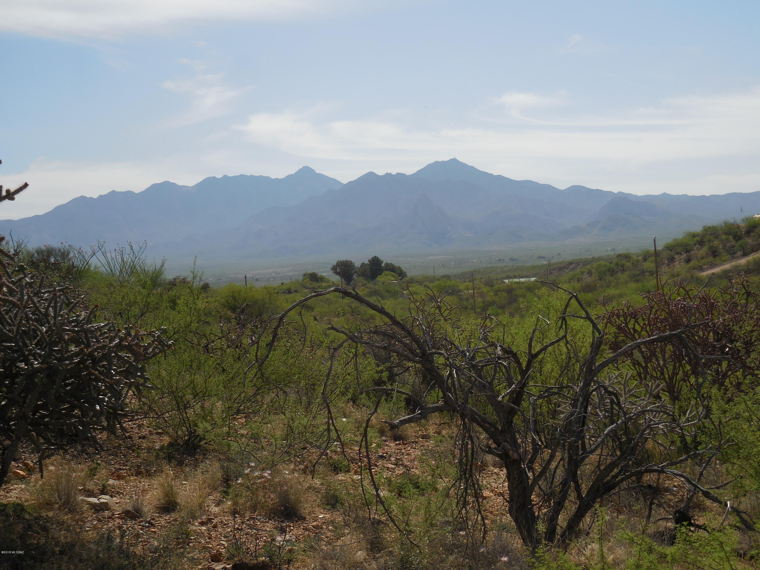 Excellent site for a custom home. This acreage provides privacy plus, and outstanding 180 degree views. You can make this your country dream home.