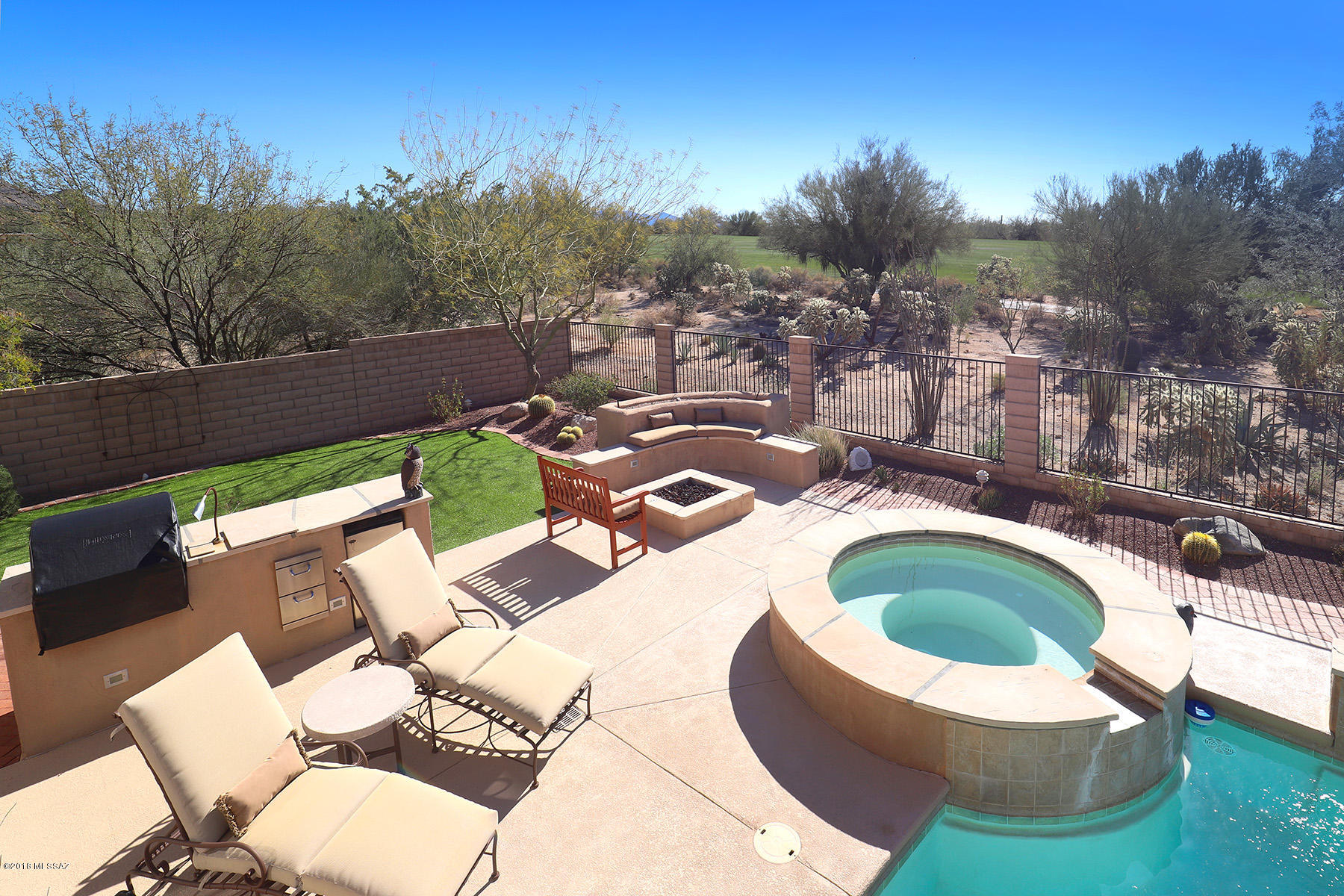 Stunning home on the golf course in gated Dos Lagos!Wall of windows overlook pool, golf course & mountains Welcoming foyer opens to great room w/ built in entertainment center w/cabs & wine bar! Cantera stone fireplace. Beautiful crown moldings accent main rooms along w/ decorator touches & neutral paint throughout.  Formal dining w/ tray ceiling. Dream kitchen features 5 burner gas cooktop, wall oven & micro, Dacor warming drawer, desk area & more storage in nook area.  Large master suite w/ bay area seating & patio access. Roomy bath w/ soaking tub, custom closet. Office/den is outfitted w/ 2 built in desk areas & shelving/cabs.  Two add'l BR's have walk in closets. Laundry has sink, cabs, counter area. Huge  pool w 2 waterfalls & spa, built-in BBQ, fire pit w banco seating