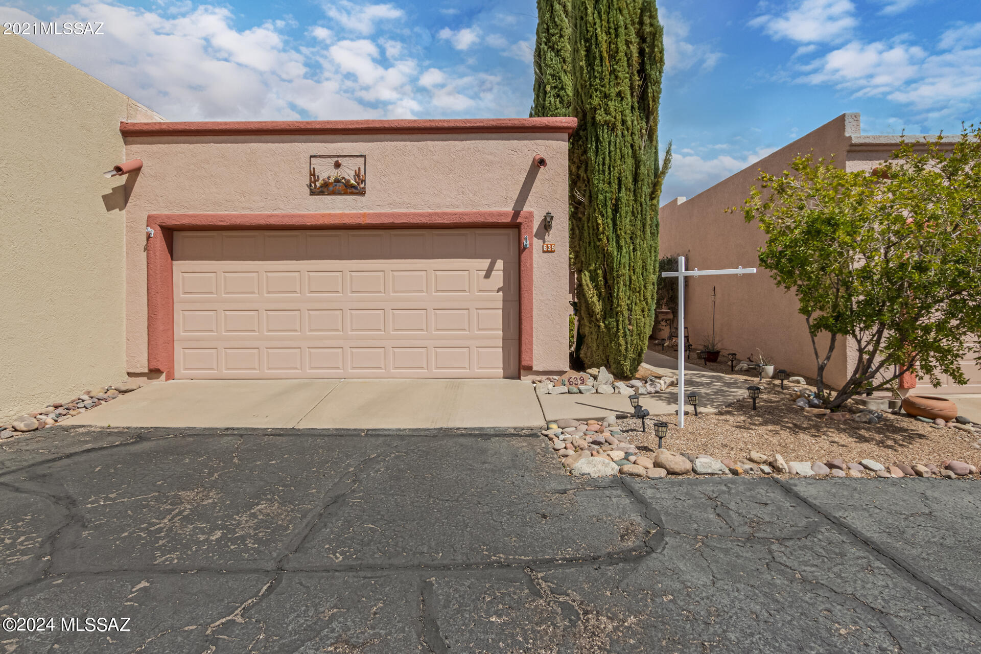 Nestled against the picturesque backdrop of the majestic Santa Rita Mountains, this captivating 2 bed, 2 bath townhouse offers an unparalleled blend of natural beauty and modern comfort. Prepare to be enchanted by breathtaking views that greet you from the back inviting you to indulge in a lifestyle of tranquility and serenity. The bright and airy living space adorned with tasteful finishes, tall ceilings and an abundance of natural light. The highly desired layout seamlessly flows from the living area to the dining space and kitchen, creating a perfect setting for both relaxation and entertainment.Retreat to the spacious primary bedroom complete with plush carpeting, ample closet space, and a luxurious en-suite bathroom, this master retreat is the epitome of comfort and relaxation. The second bedroom is equally inviting, offering versatility for guests, a home office, or a cozy reading nook. Step outside to your own private oasis - a screened-in Arizona room that seamlessly blends indoor and outdoor living. Here, you can savor your morning coffee while soaking in the breathtaking views of the Santa Rita Mountains or unwind with a glass of wine as you watch the stunning Arizona sun set off in the horizon. This townhouse offers the perfect balance of tranquility and convenience and savings.  Enjoy the lifestyle of Green Valley by utilizing the several amenities that the Green Valley Rec offers. Everything from Special interest clubs to Pickelball!  This home has it all!