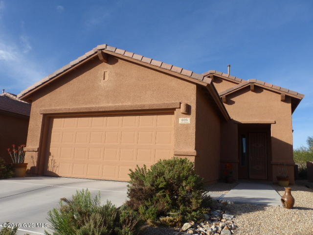 Charming home in the heart of Green Valley, 2 bedrooms, 2 baths, den and a 2 car garage. Tile floors, Corian counter tops, fans and many more features. Low care yards great for entertaining with a pergola for extra shade. This home backs up to open desert. Furniture is available. Must See!!!