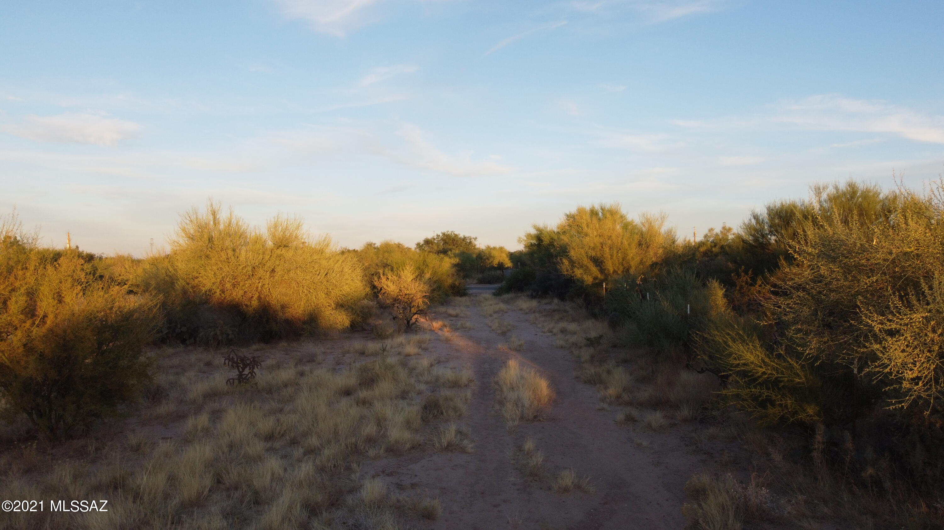 Flat and level homesite with septic that is perfect to build your dream home on the range! The lot is huge and has plenty of room for toys and animals. This is rural living at its best! Come see it today and make it yours! Owner is a licensed agent.