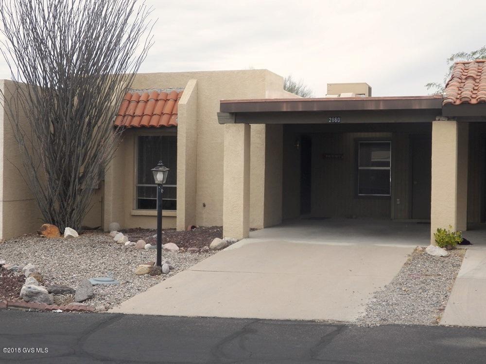 The remodeling of this 2BR 2BA townhome just got a whole lot easier. The basics in a neutral tone have been completed. You will see beautiful 20 inch porcelain tile everywhere except in the bedrooms with new carpet. Clean desert tones abound on the walls and floor. Look up  No popcorn ceilings. Now add your own personal touches. In between projects relax on the back patio enjoying the sights and sounds of the desert. Or go for a swim at the nearby Rec Center.